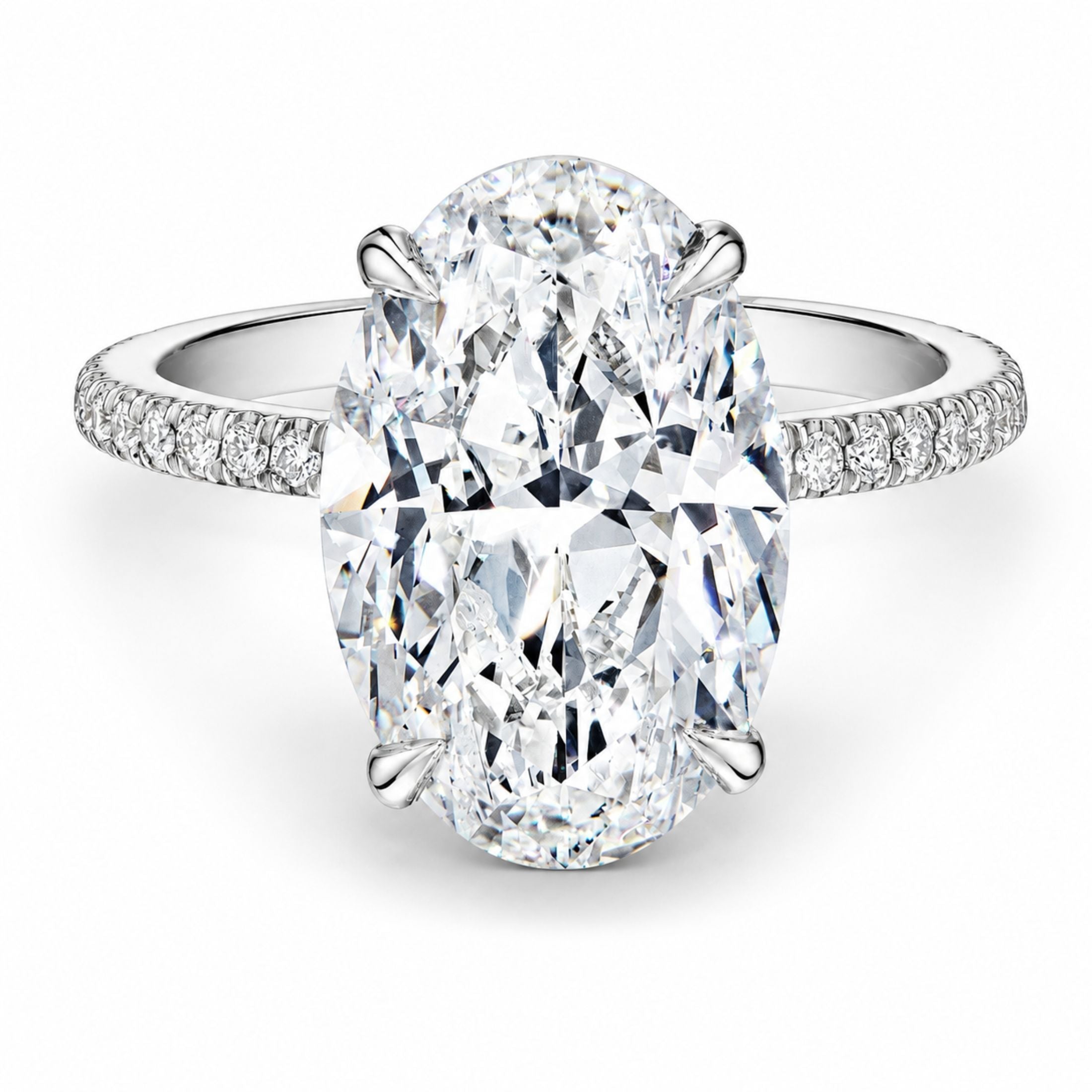 Leviev platinum oval cut diamond ring with four prong setting and pavé band