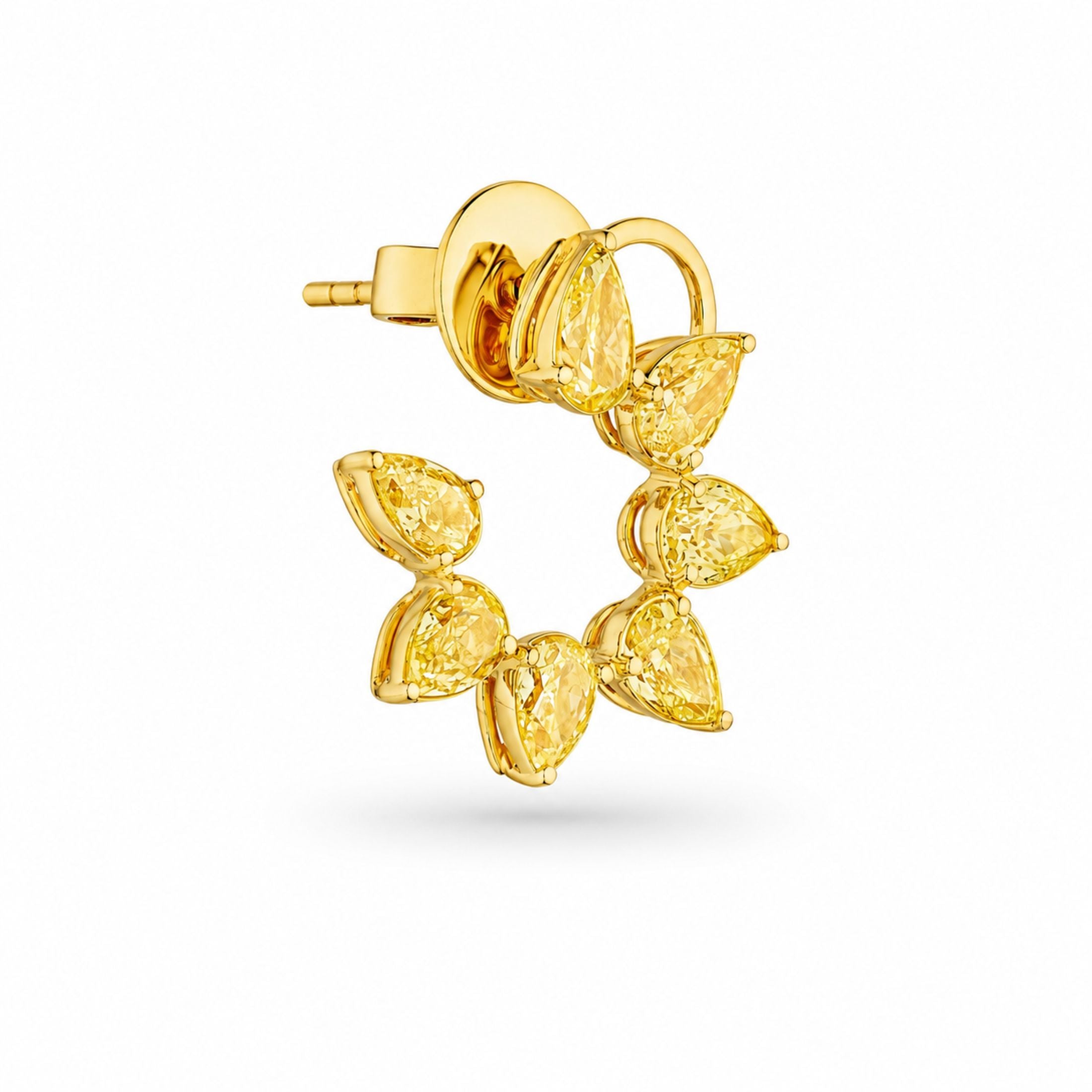Side view of Leviev Aurelia Sun yellow diamond earring showing open sunburst design