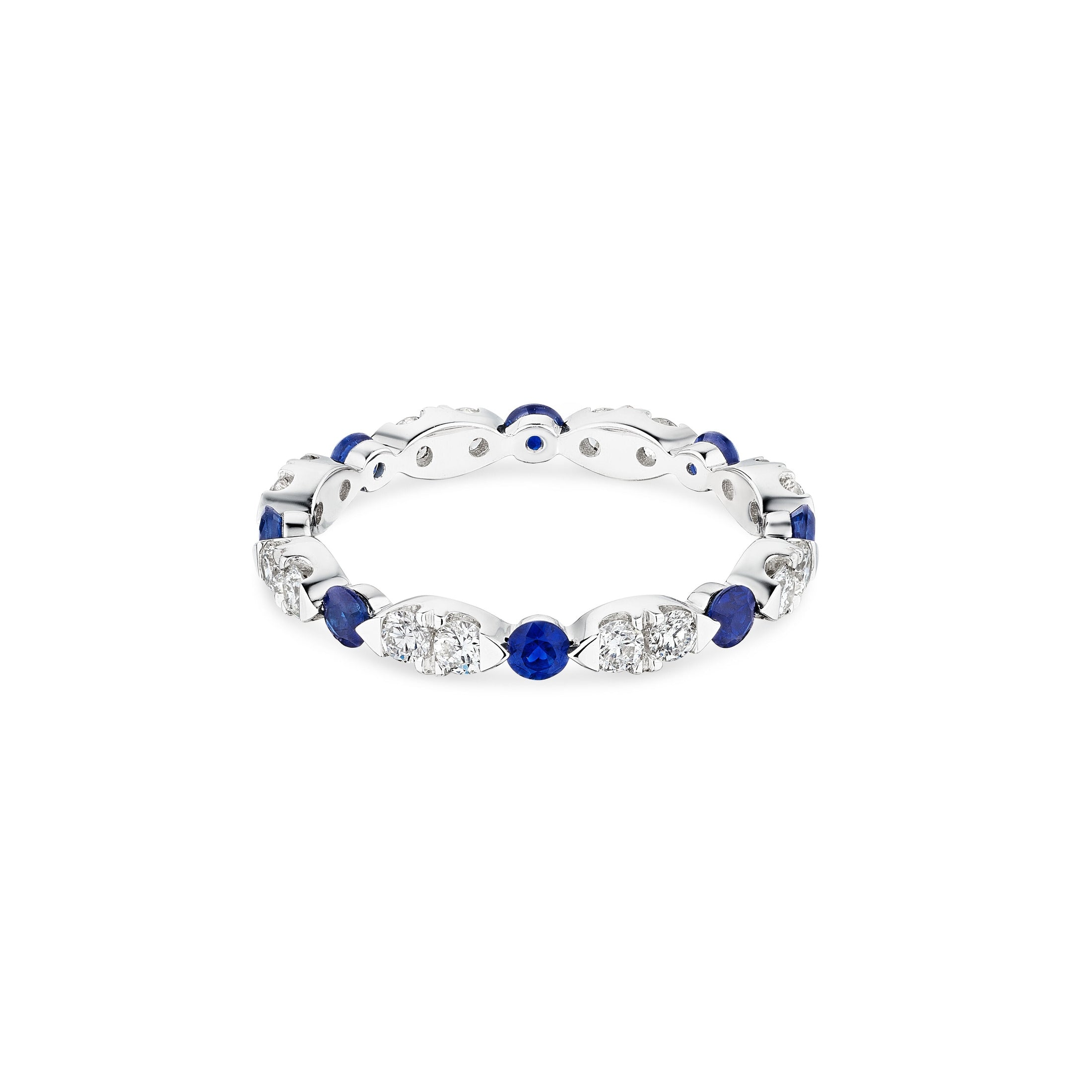 Top view of Azure Crown diamond ring with scalloped leaf design featuring paired diamonds and single royal blue sapphires in 18K white gold