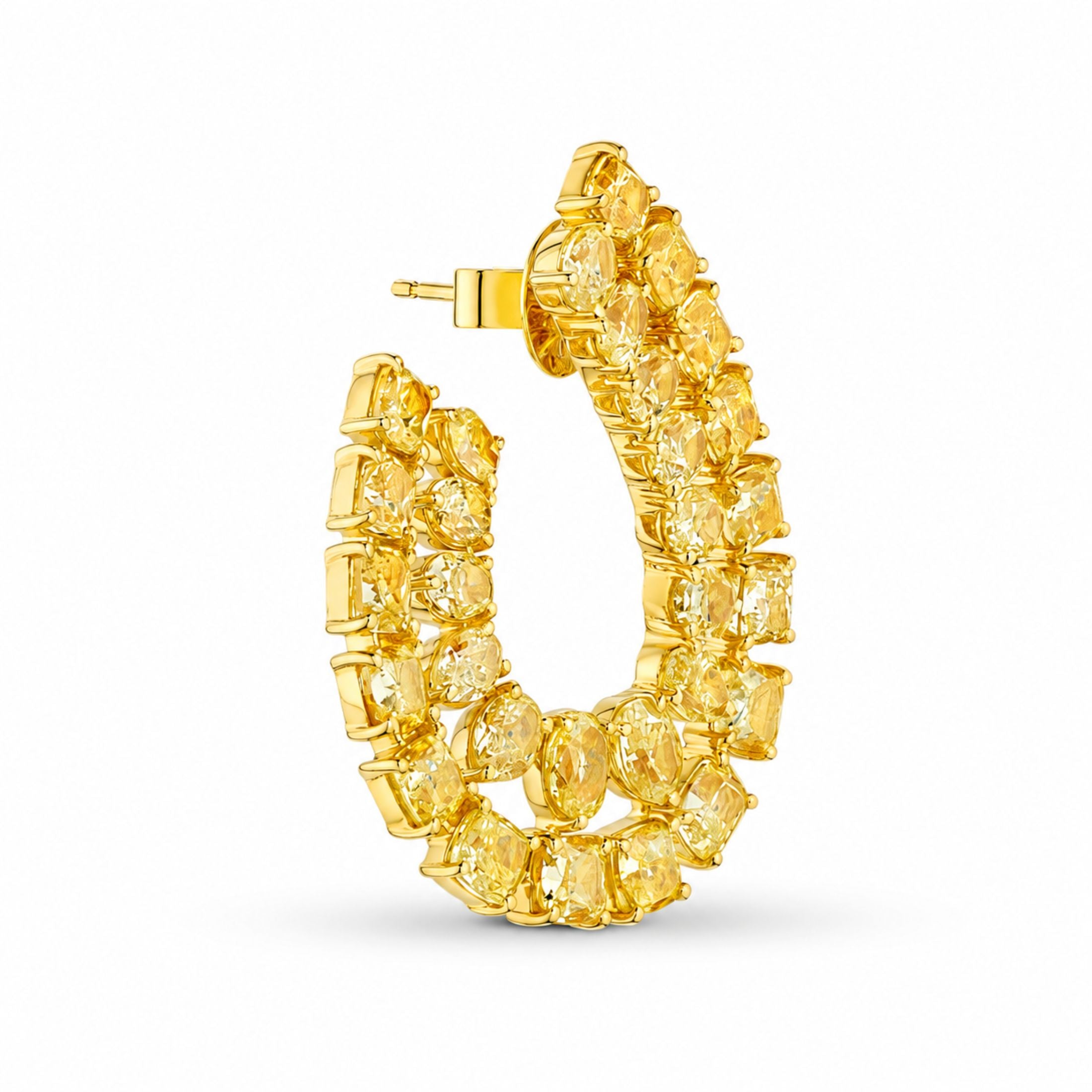Side view of Citrine Tide yellow diamond cuff earring in 18K gold showing mixed cushion oval pear brilliant cuts and sculptural C-shape