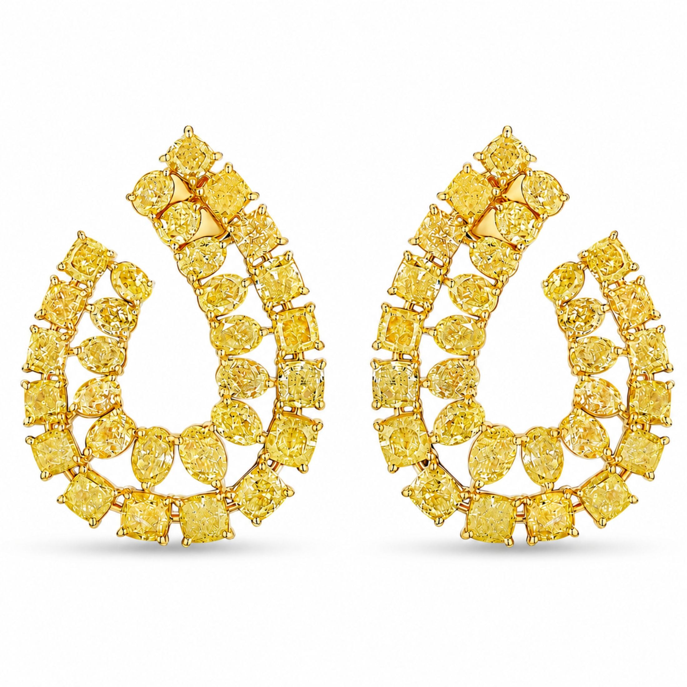 Front view of Leviev Citrine Tide pair yellow diamond earrings in 18K gold with asymmetrical cascading multi-cut stones