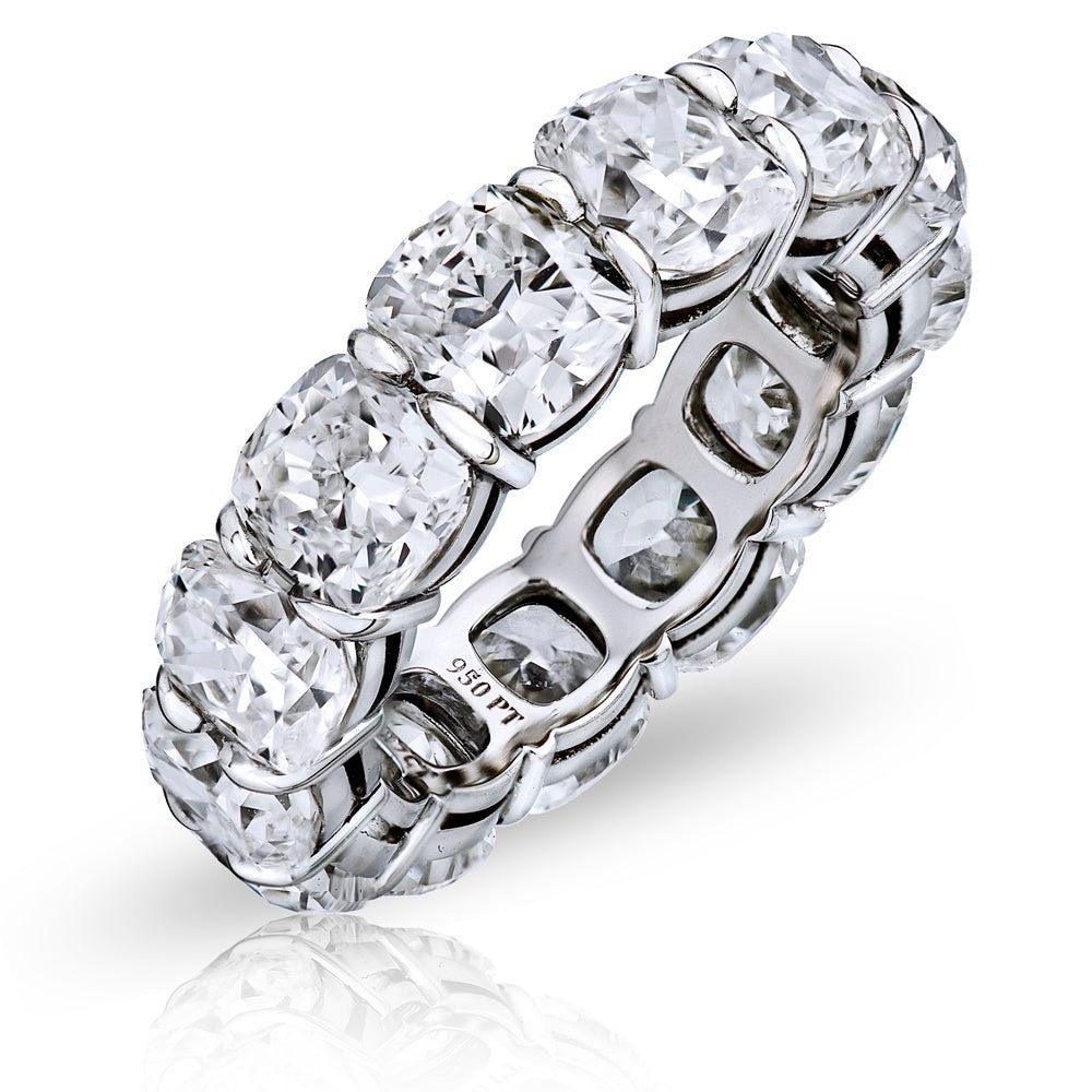Platinum eternity band with 13 cushion cut diamonds and side stones