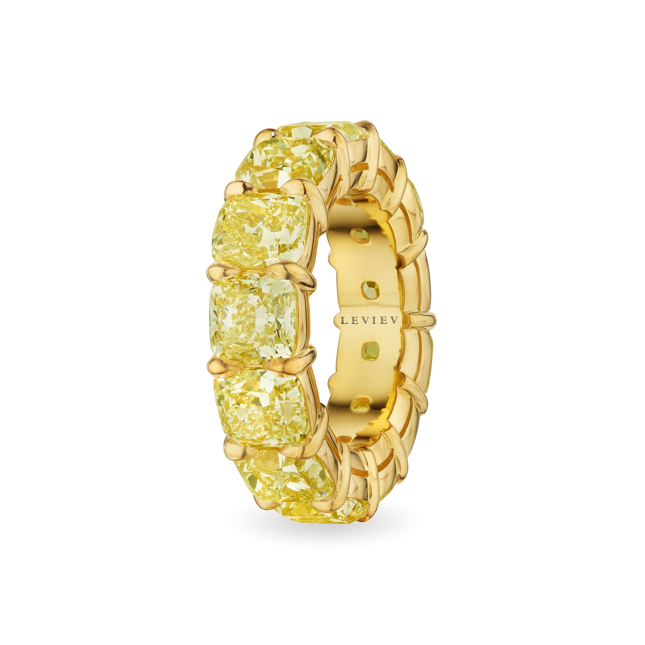 Side view of Leviev 13 carat yellow diamond eternity ring showing twisted gold profile and engraved shank