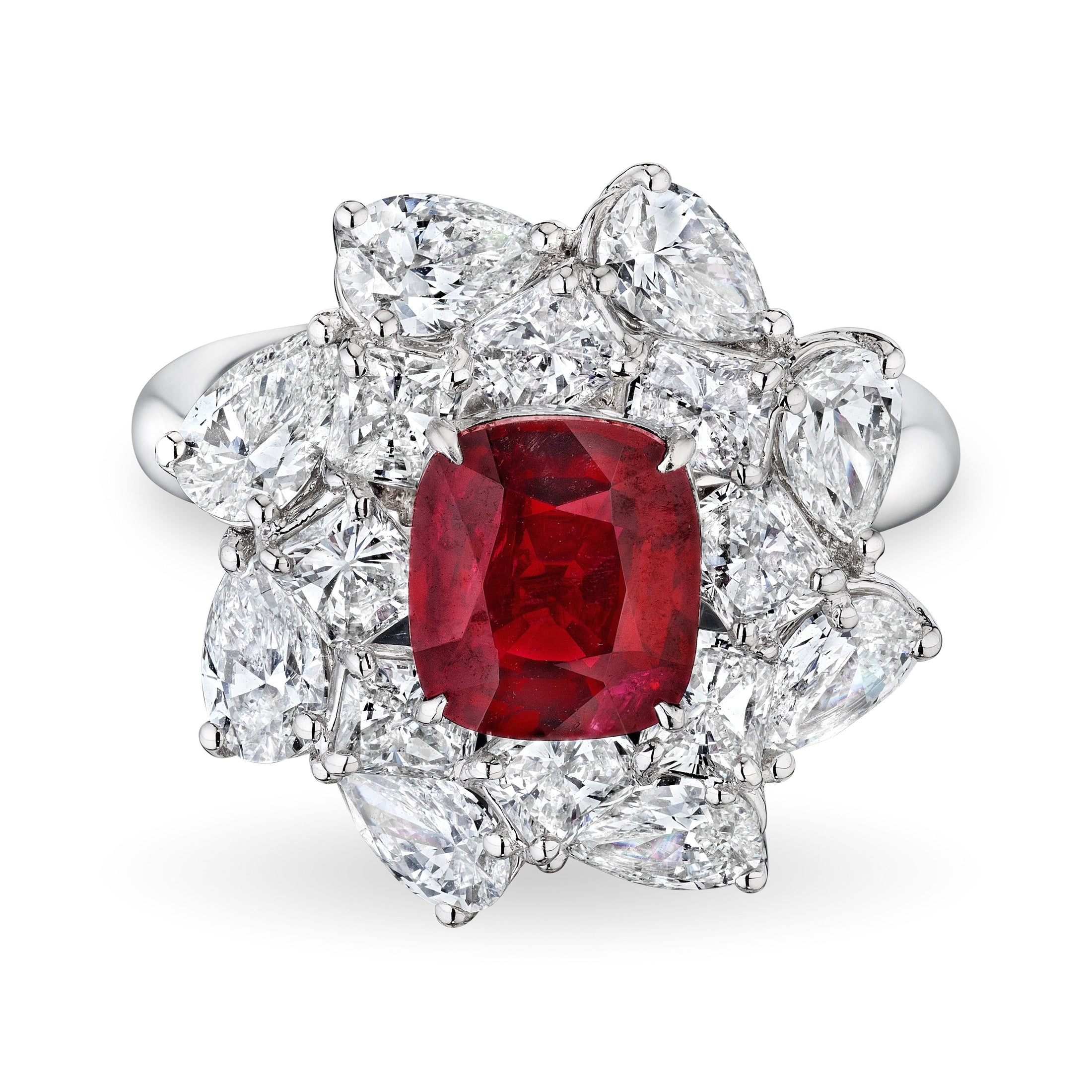 Top-down view of 2 CT cushion cut ruby ring surrounded by marquise and pear shaped diamonds
