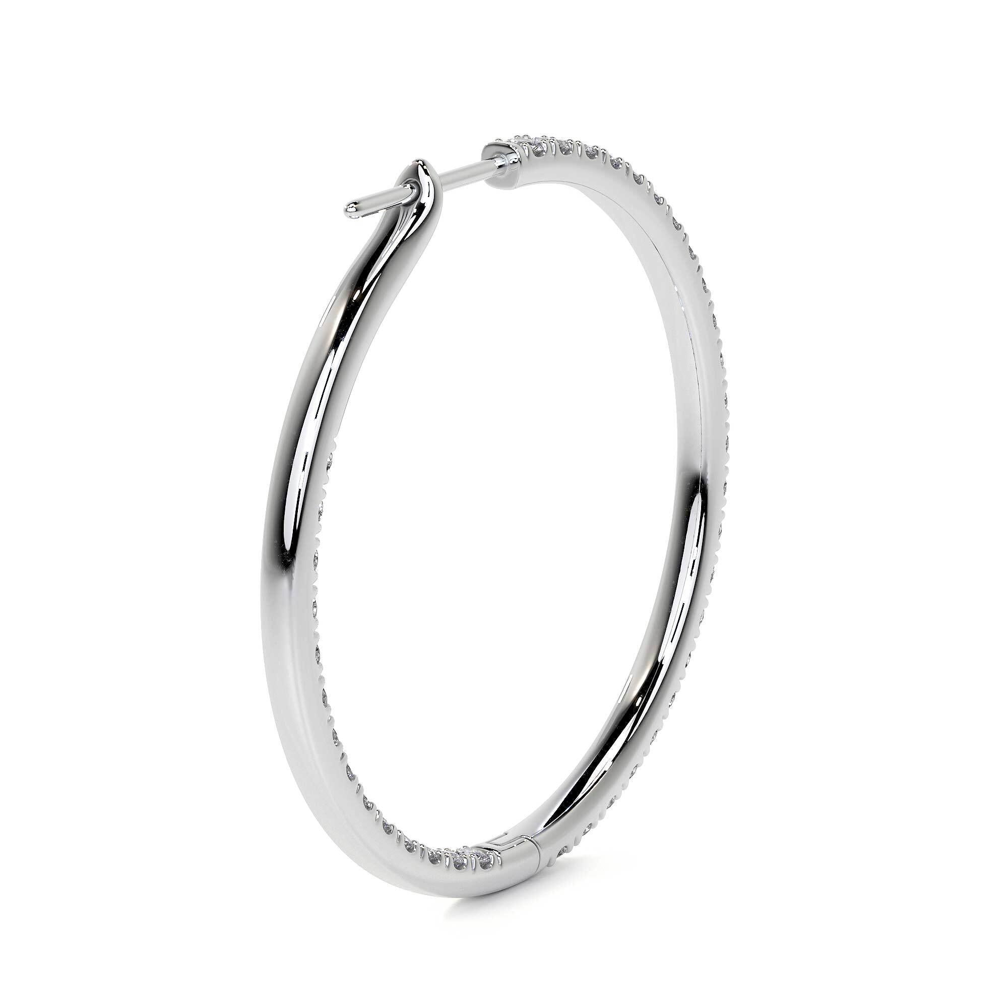 Hinged closure detail on 32mm white gold diamond hoop earrings showing secure latch mechanism