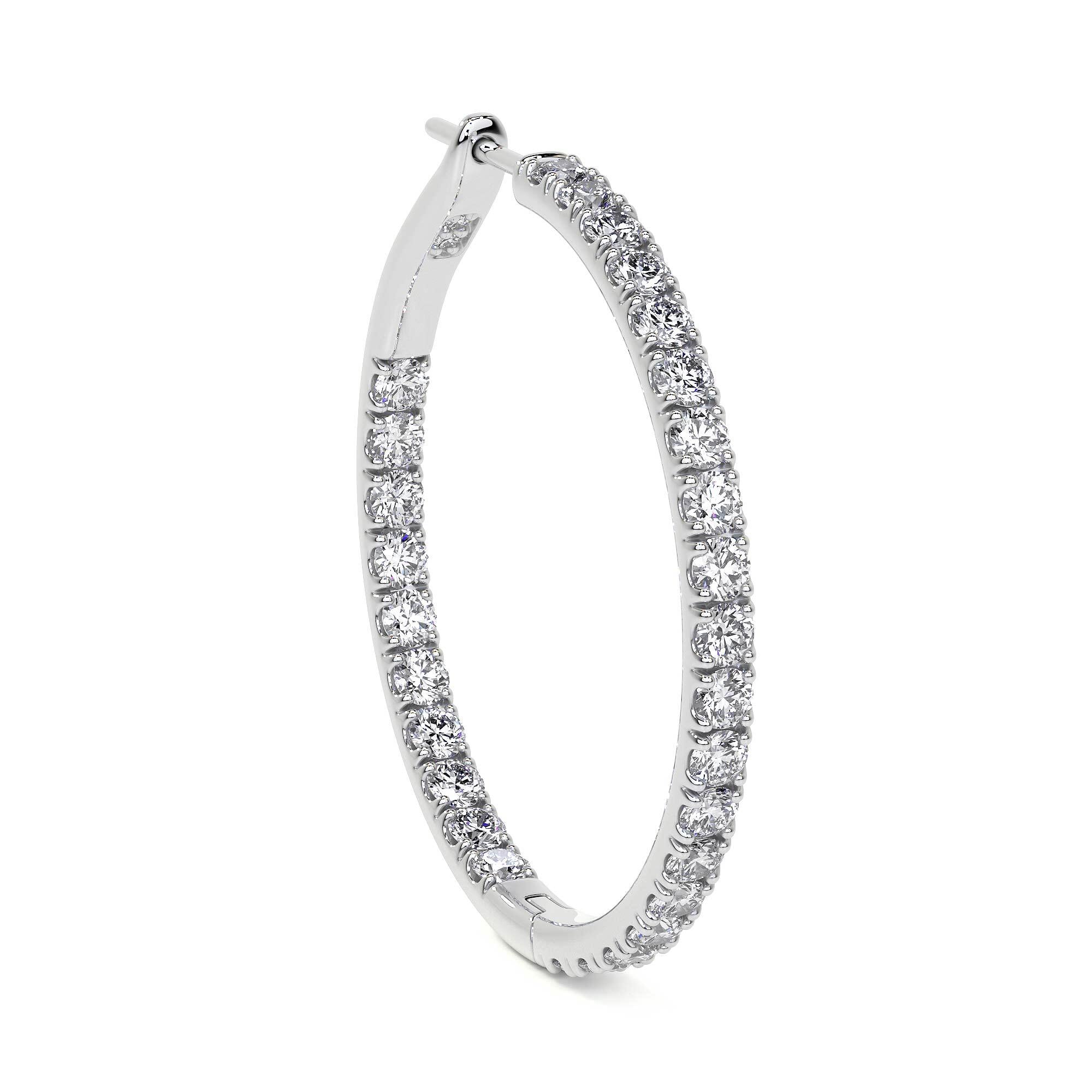 Side view of 32mm 18K white gold diamond hoop earrings with channel-set pavé and hinged closure