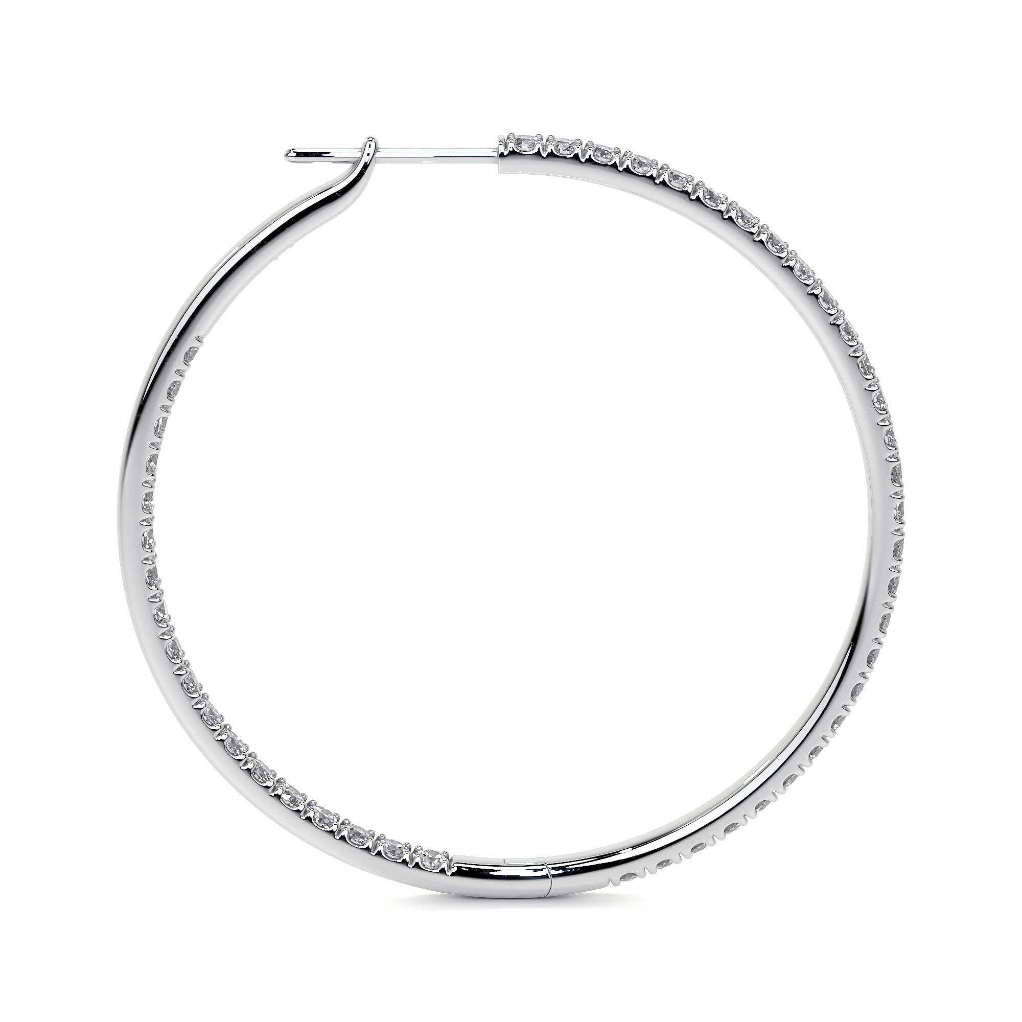 top-down view of oval 38mm white gold diamond hoop setting