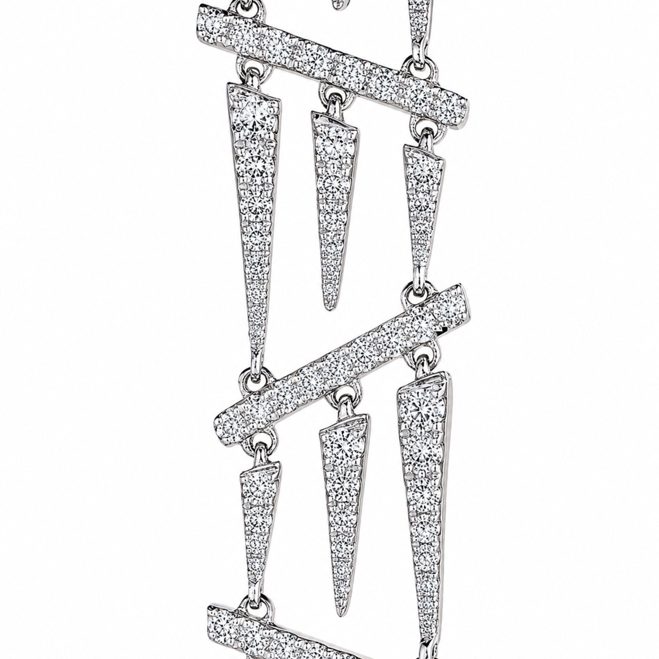 Close-up of Leviev 18K white gold pavé diamond earrings showing architectural bar and conical drop details