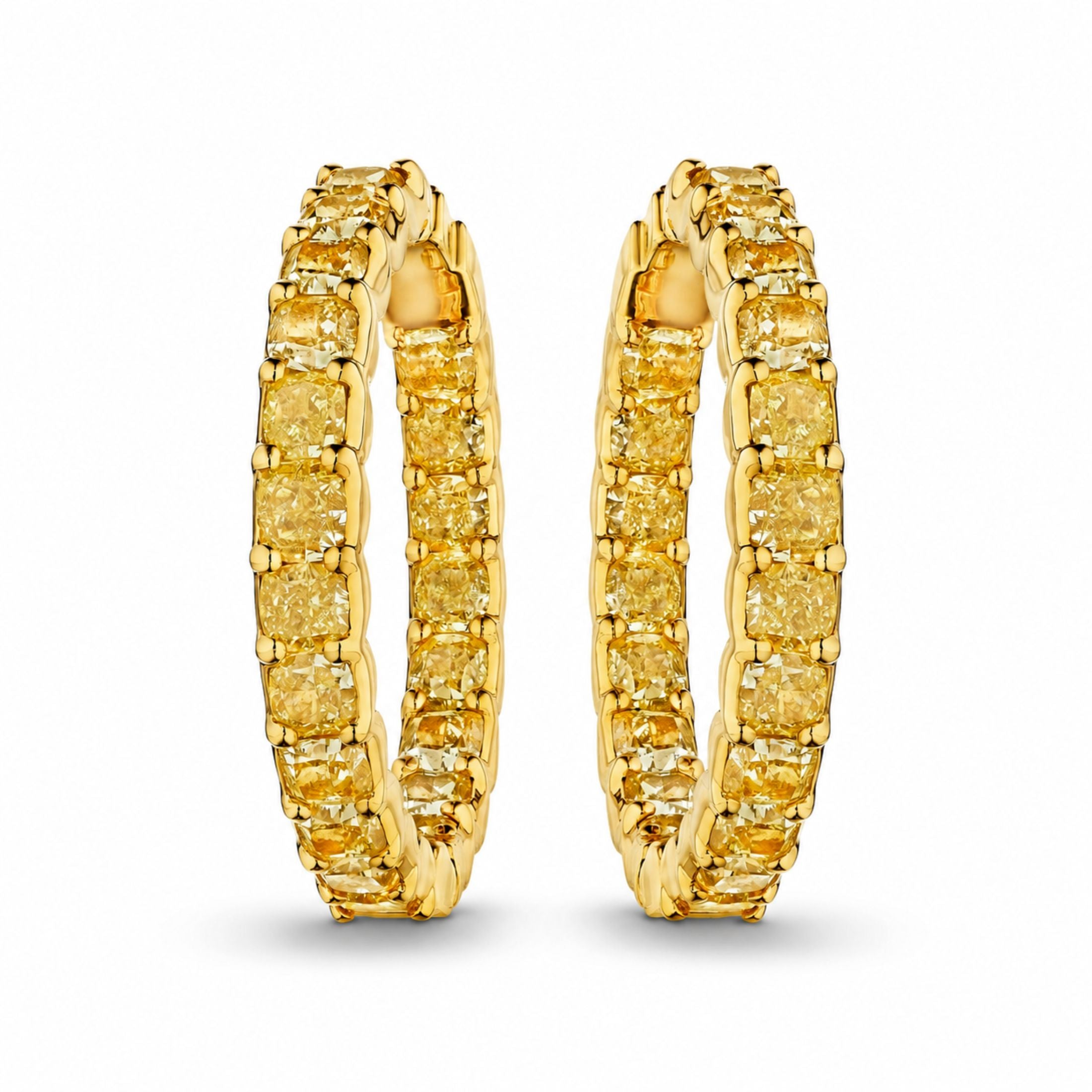 Pair of 18K gold yellow diamond eternity hoop earrings with prong-set square stones