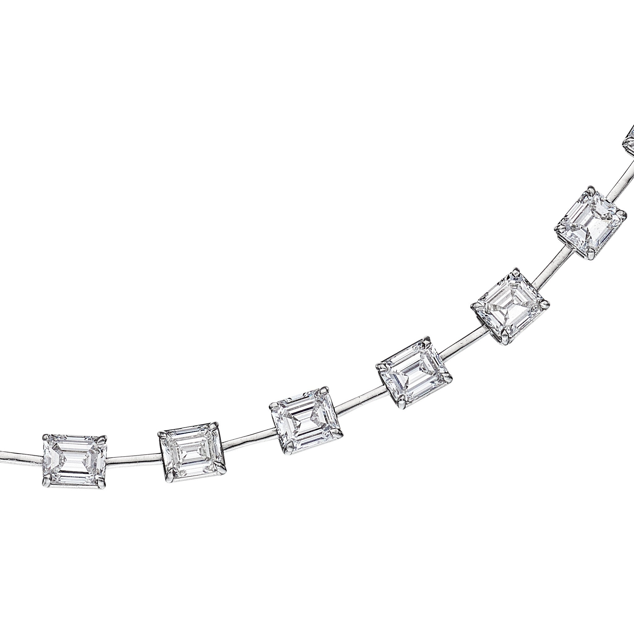Leviev platinum emerald and princess cut diamond necklace close-up four-prong setting
