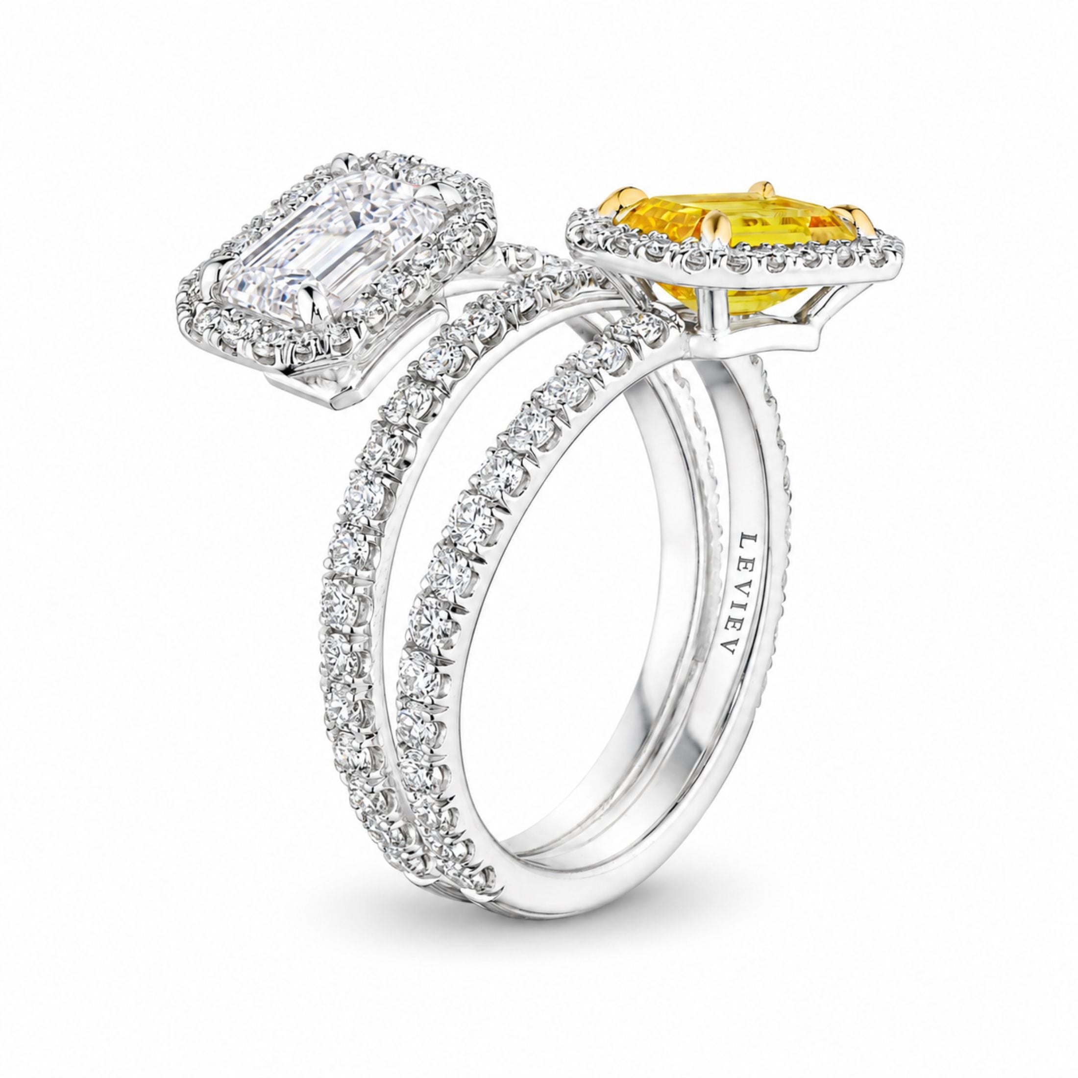 Leviev Gemini bypass ring with emerald-cut yellow and white diamonds, double-stranded pavé band, engraved LEVIev shank