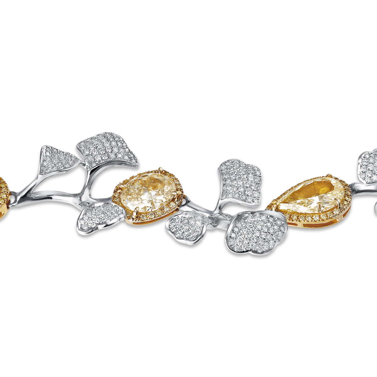 Close-up of Leviev Ginkgo Bloom necklace featuring fancy yellow cushion-cut diamonds and white diamond pavé