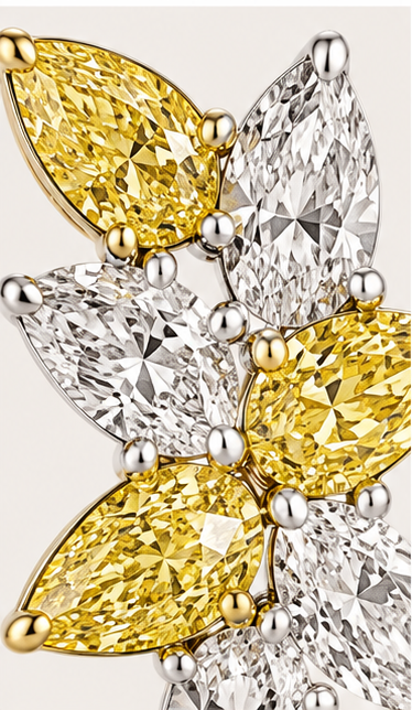 Close-up of Hale marquise-cut yellow and white diamond cluster set in 18K white and yellow gold