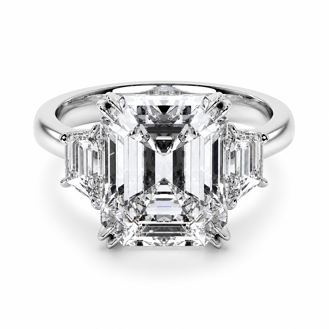 Heirloom platinum emerald cut diamond ring with tapered baguette side stones front view