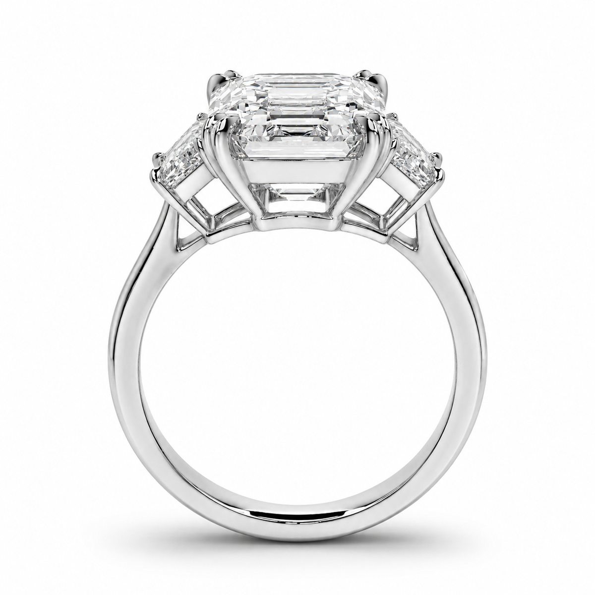 Back view of Heirloom platinum emerald cut diamond ring revealing open-backed prong setting