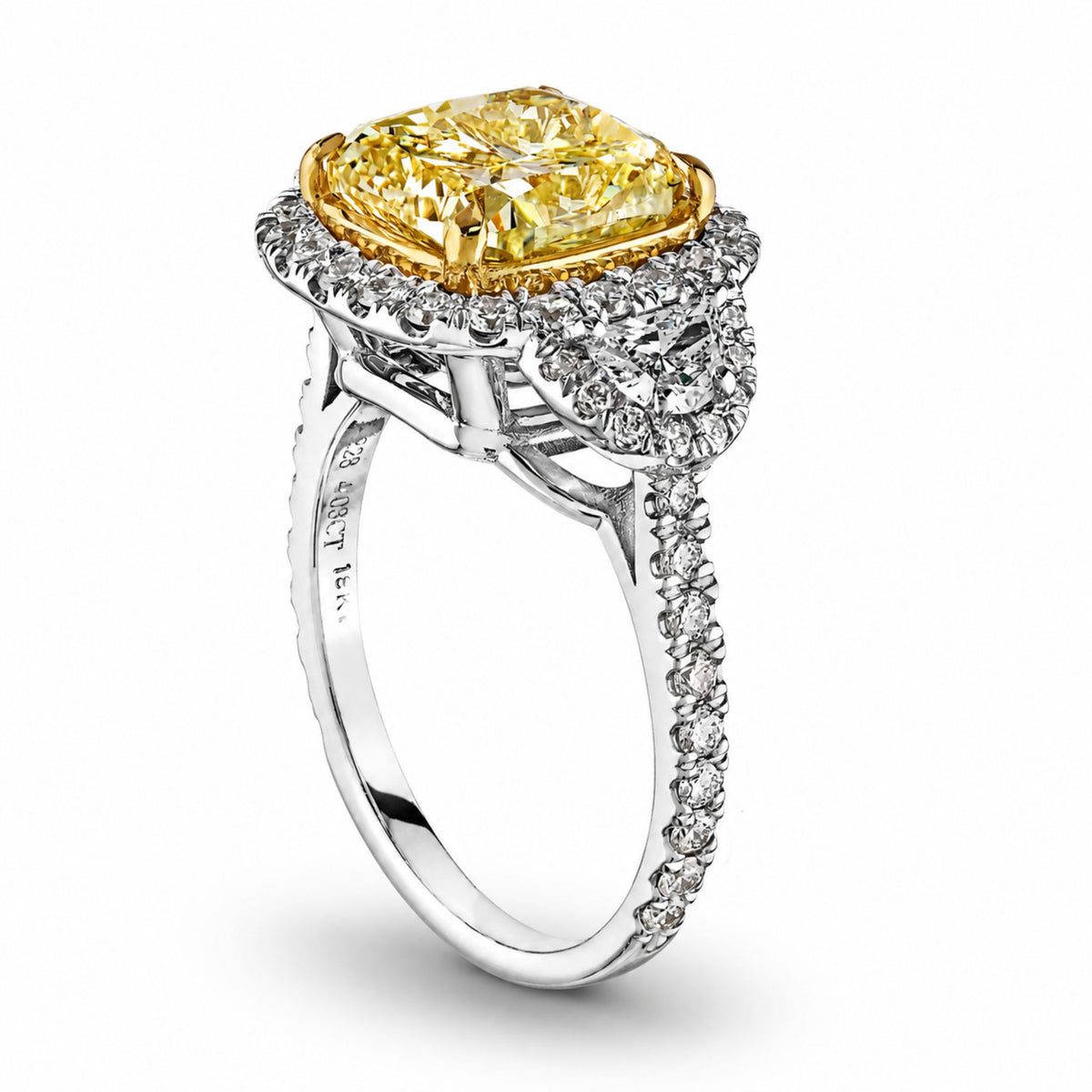 Side view of Helia 5.15ct yellow diamond ring showing 18K gold prongs, half-moon shoulder stones, and engraved band