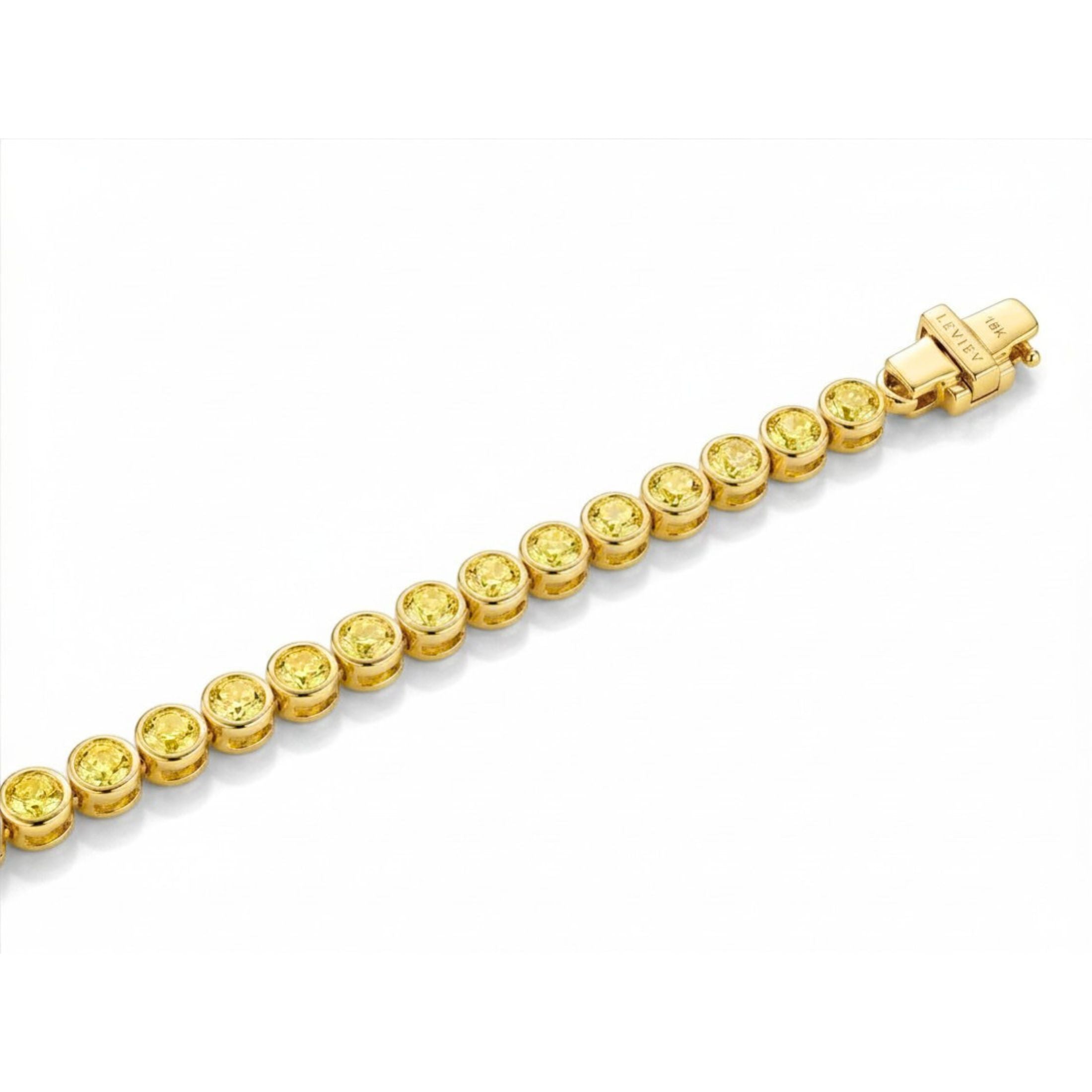 Leviev engraved 18K yellow gold tennis bracelet close-up