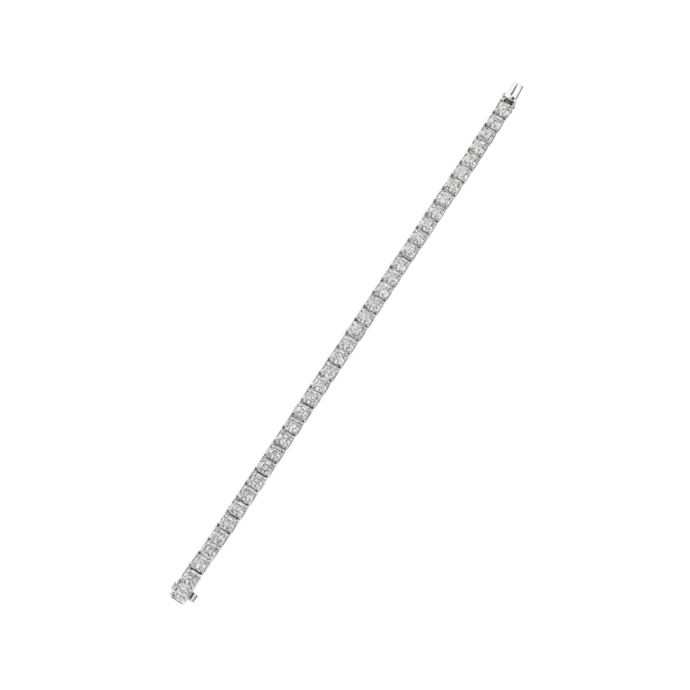Full-length view of Leviev platinum diamond tennis bracelet with hinged clasp and Art Deco geometric symmetry