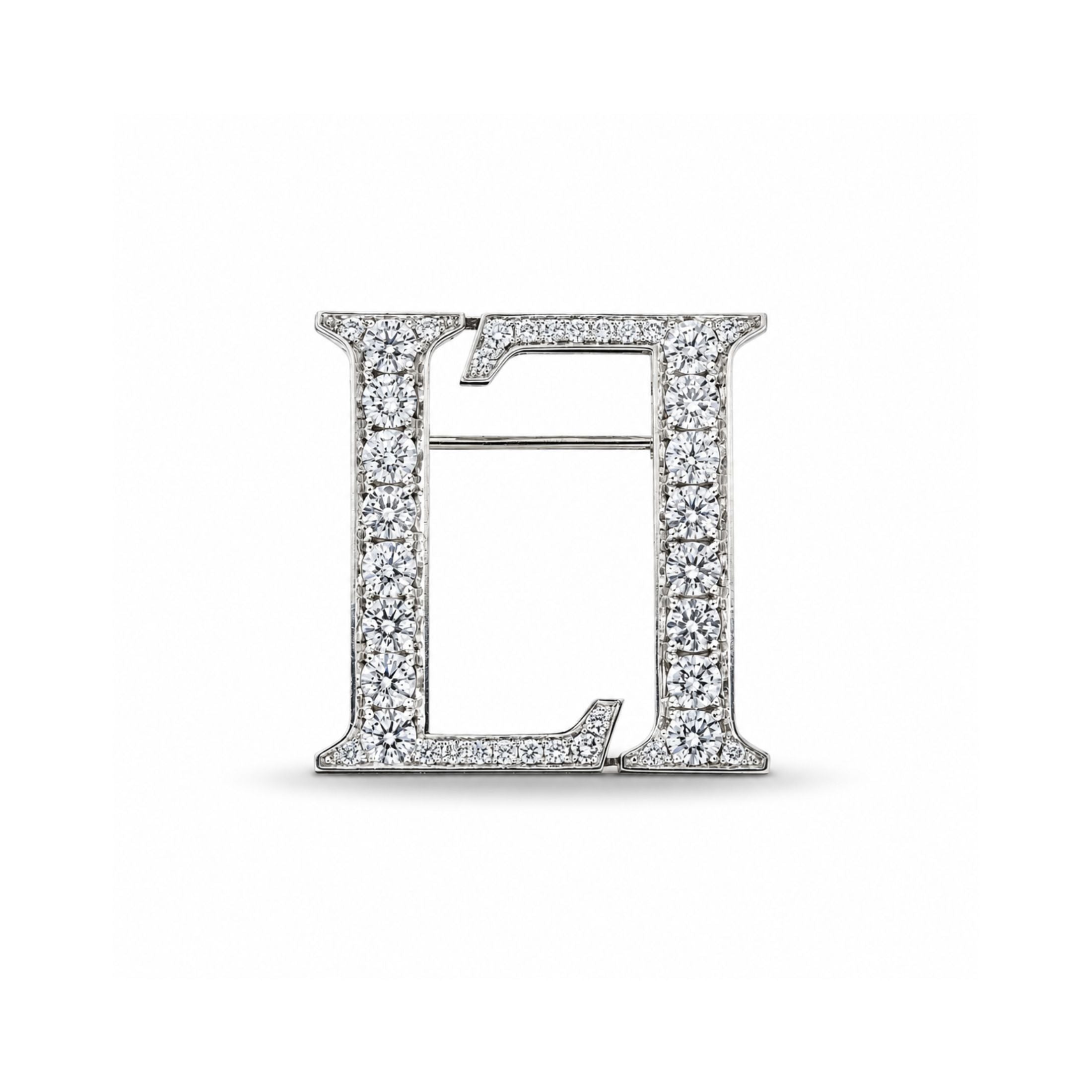 Close-up Leviev platinum diamond letter L brooch with clasp