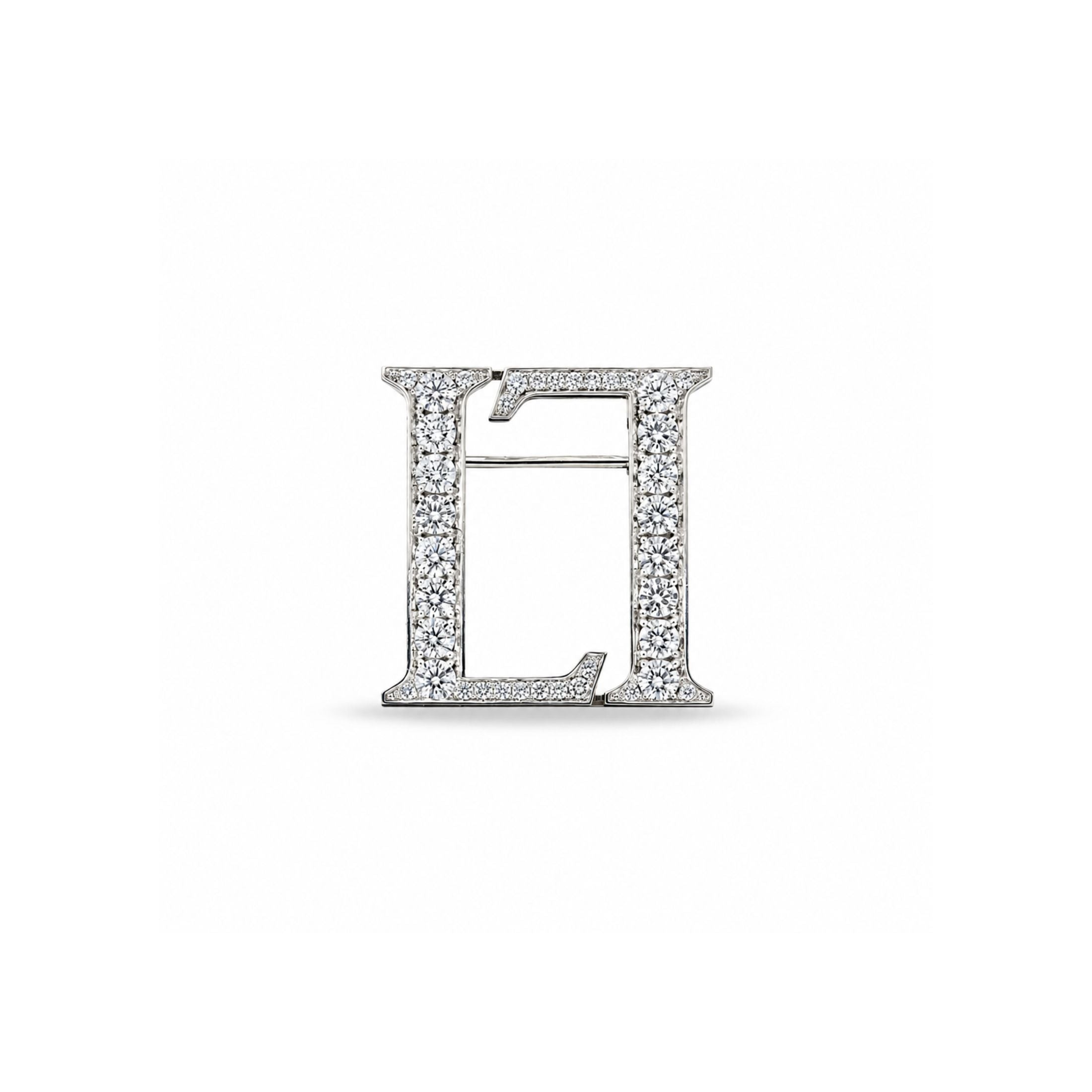 Leviev small platinum lapel pin letter L with 1.05 carat natural diamonds close-up