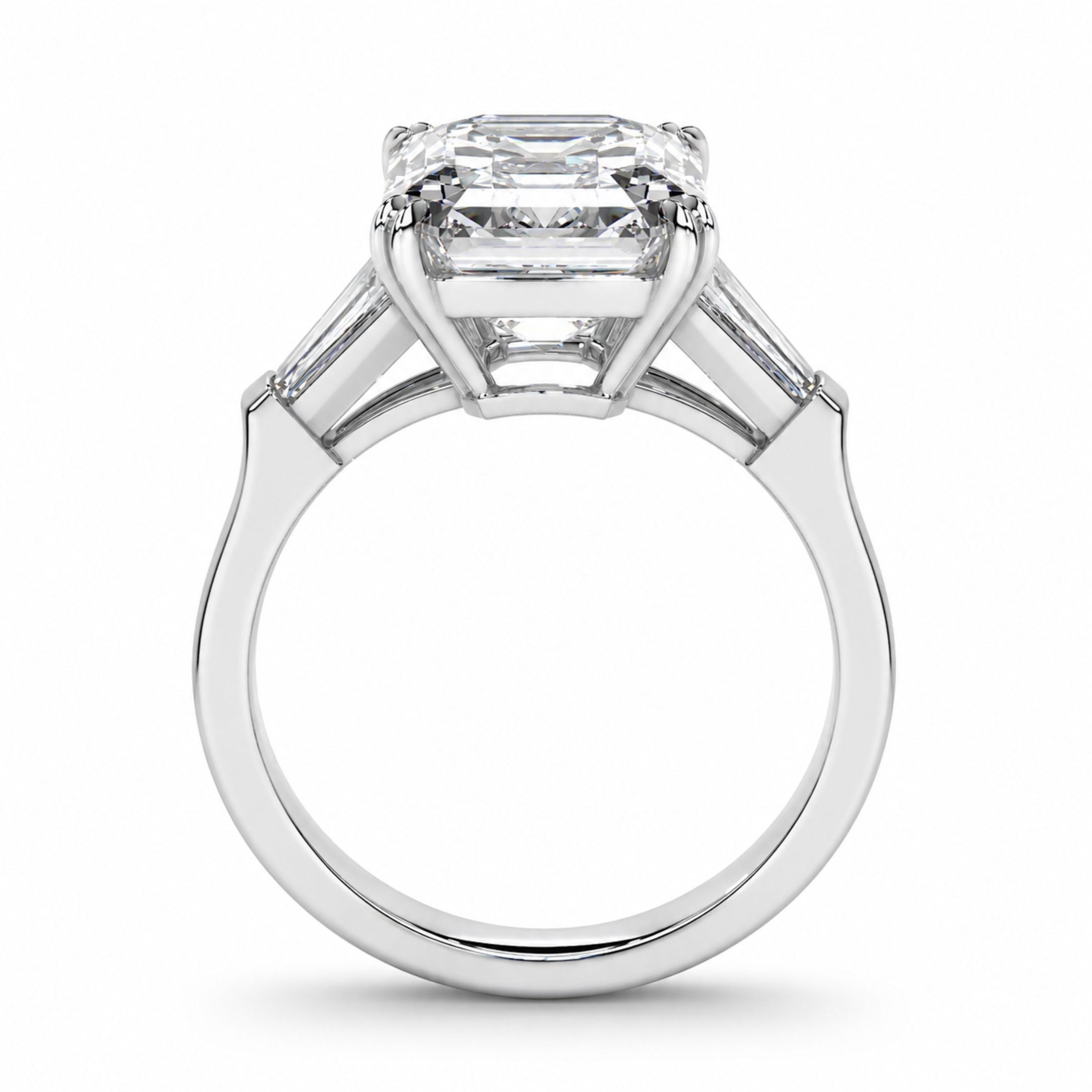 Top-down view of Leviev platinum emerald-cut diamond ring showing symmetrical baguette side stone setting