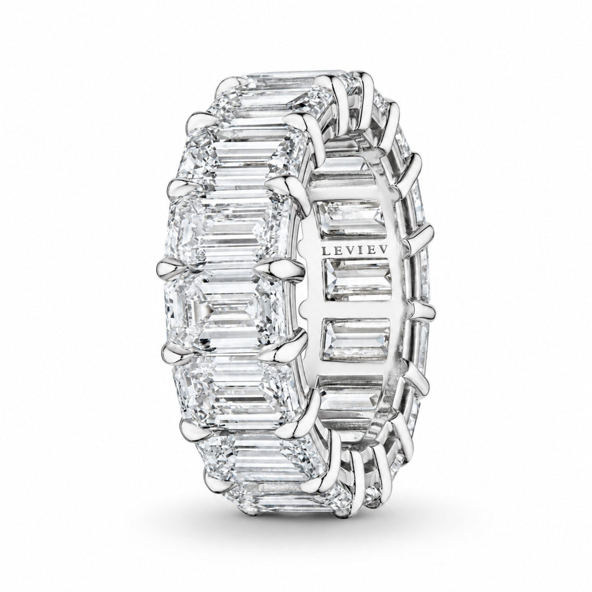 Leviev platinum eternity band with emerald cut diamonds in claw prong setting showing engraved brand name