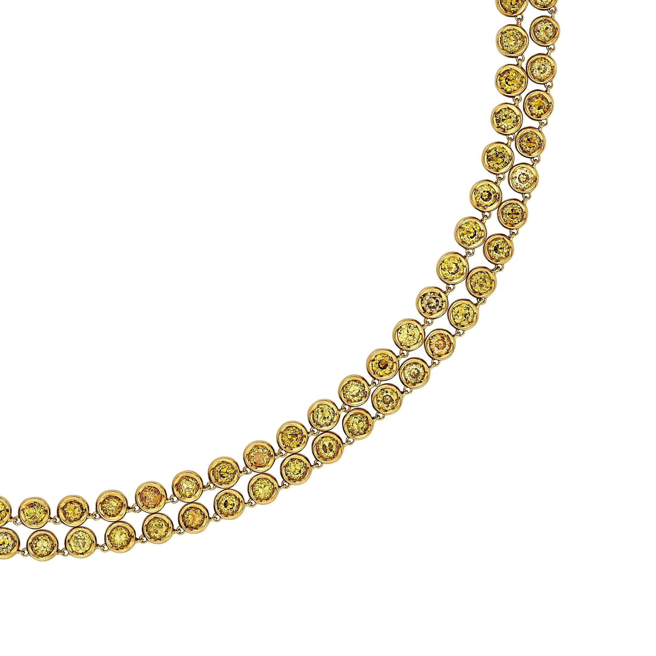 Double-strand 18KT yellow gold diamond necklace close-up showing canary and pale yellow stones