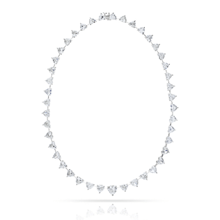 Top-down view of 65.20 carat heart diamond necklace symmetrical oval design