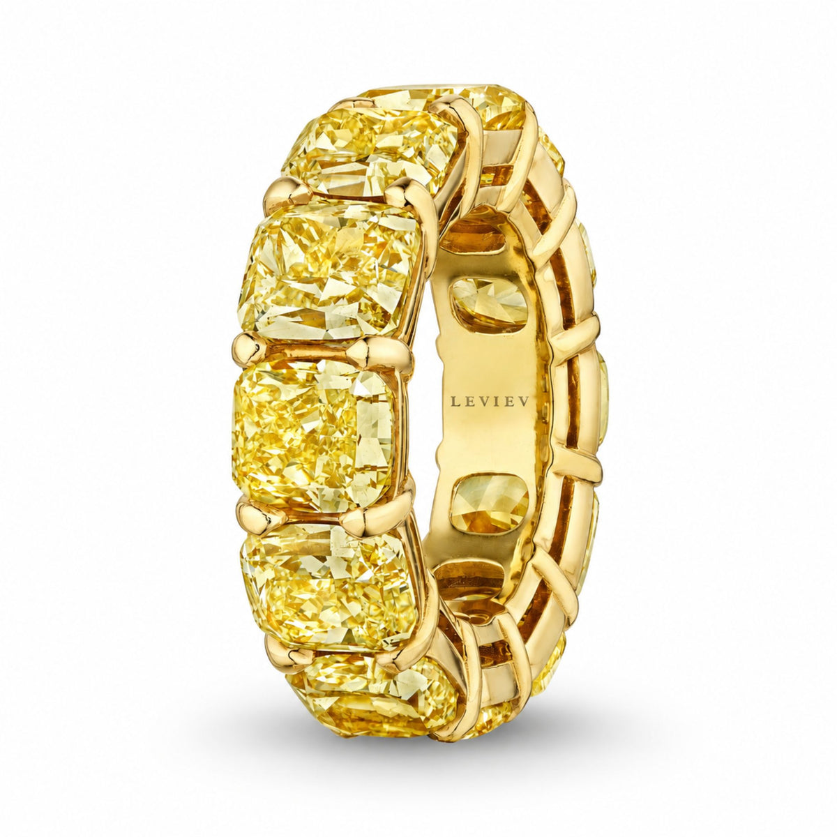 Side view of Leviev 18K yellow gold eternity band featuring sculpted ridges between 19.03ct fancy yellow cushion-cut diamonds