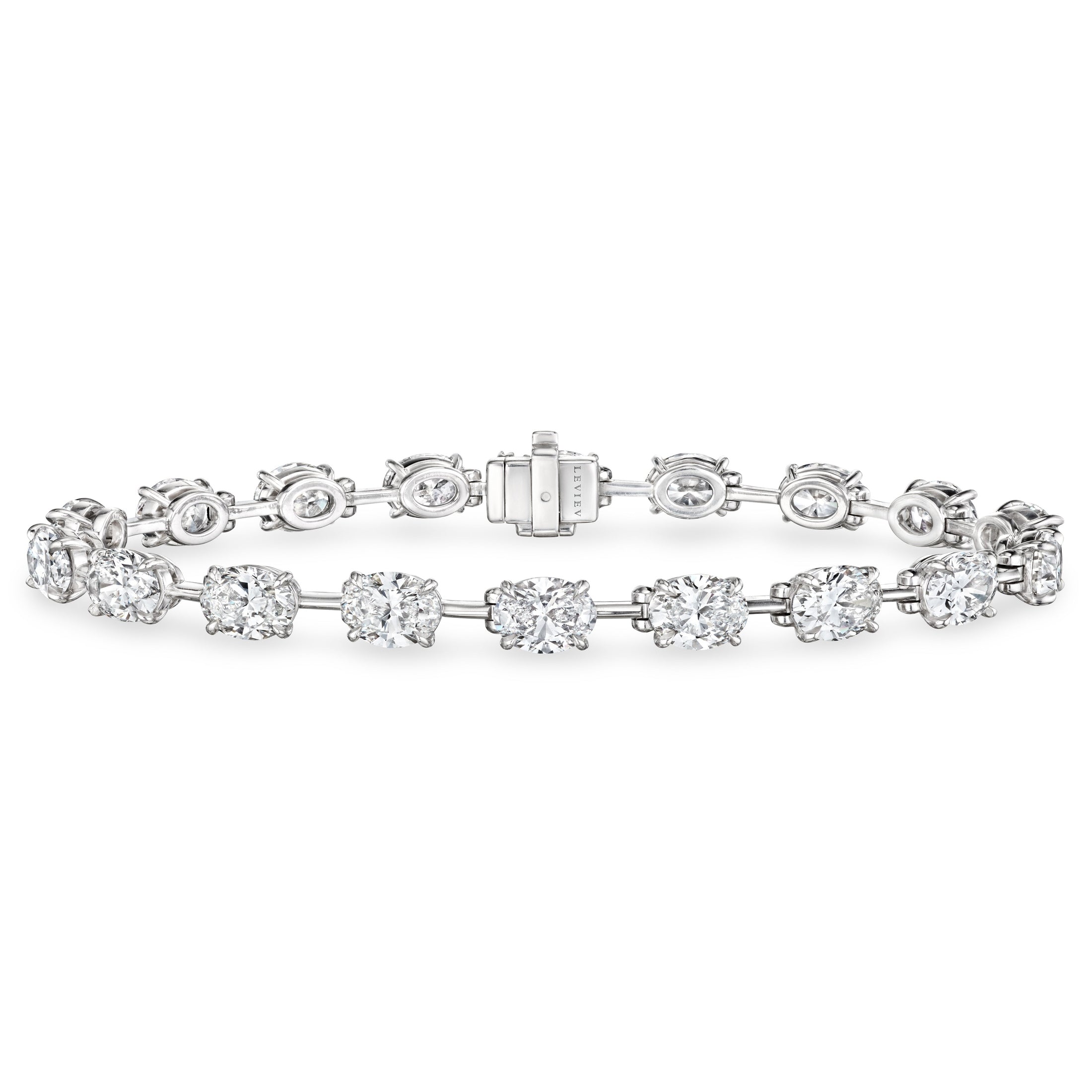 Leviev platinum diamond station bracelet flat lay showing box clasp and engraved logo