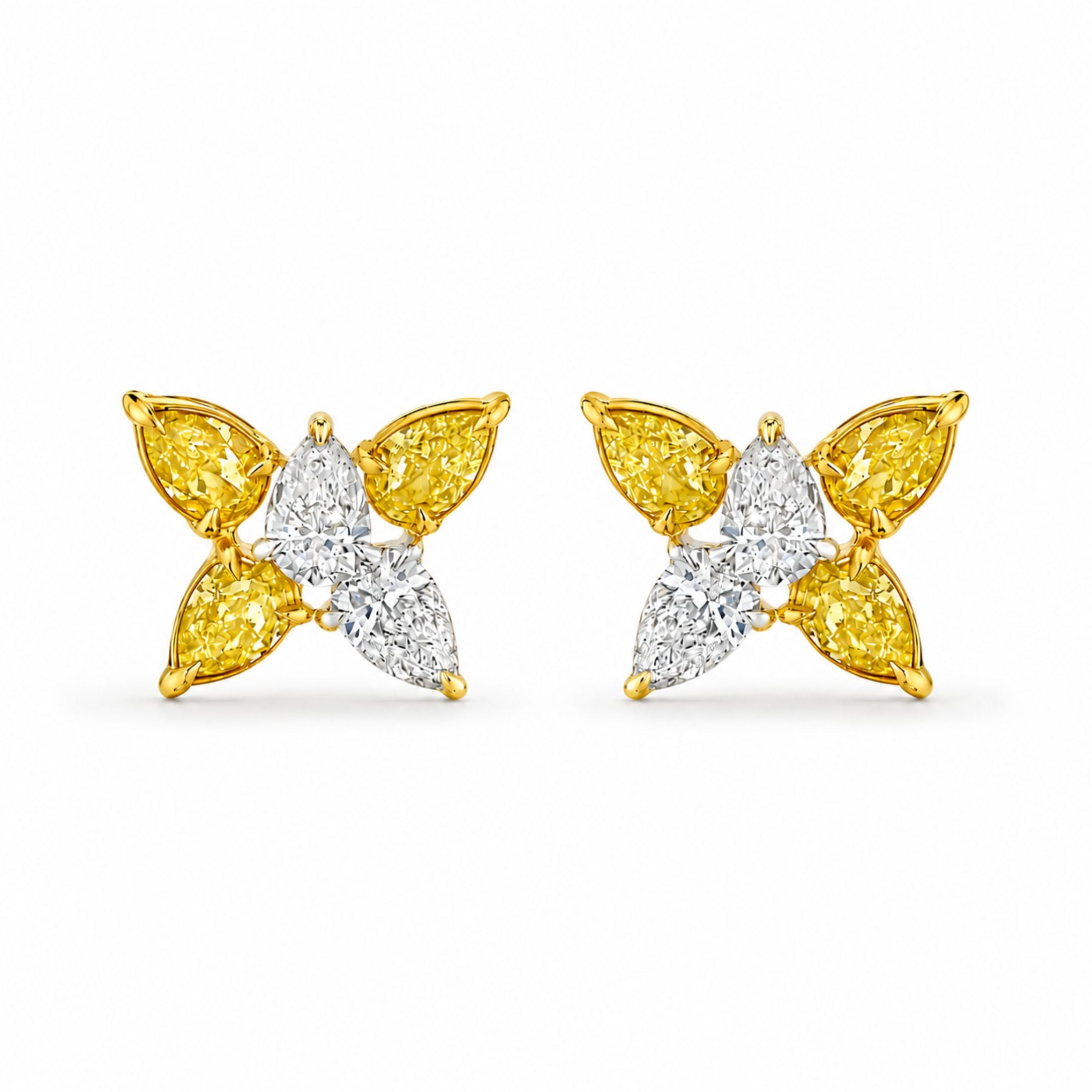 Moon & Sun Petals stud earrings with yellow and white pear diamonds in yellow gold