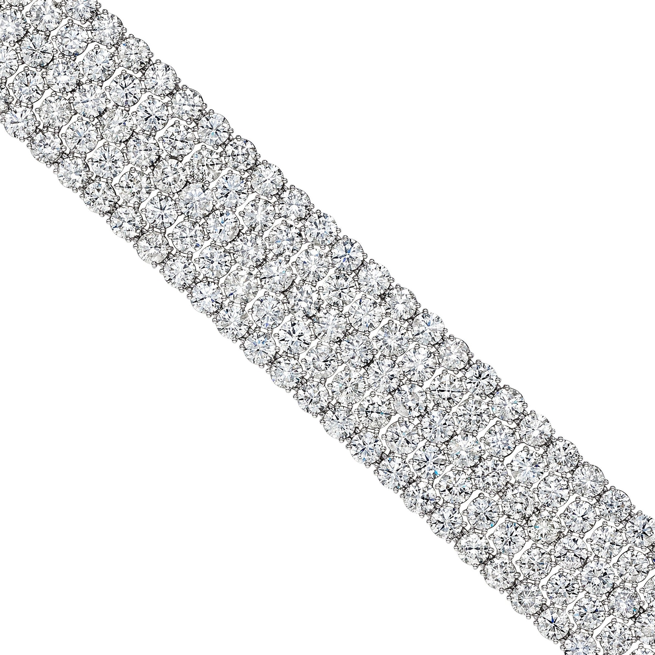 Close-up of Leviev 18K white gold diamond mosaic bracelet showing staggered round brilliant cut stones and seamless pavé texture