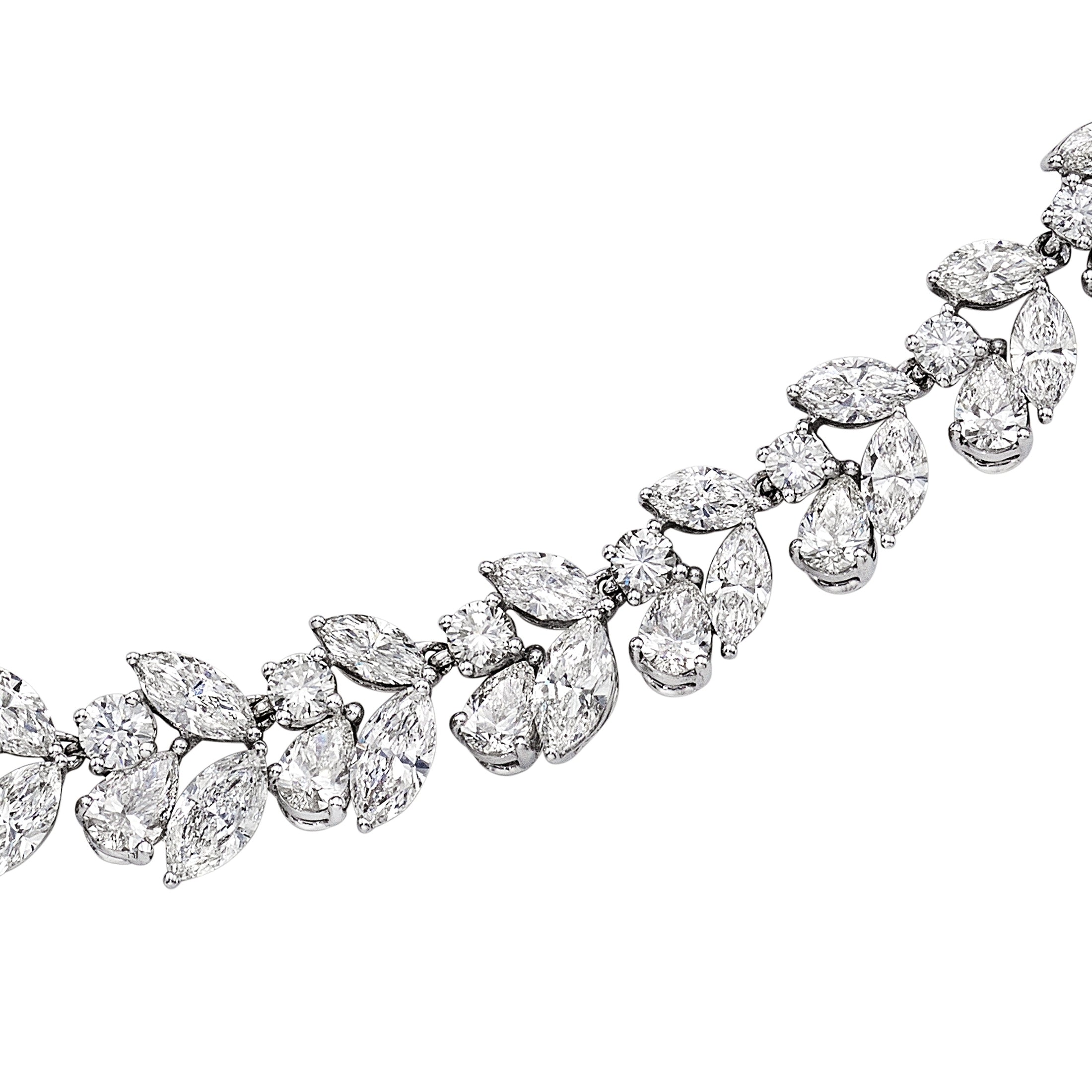 Leviev 18K white gold multi-shape diamond necklace close-up with marquise pear and round brilliant-cut stones in leaf pattern
