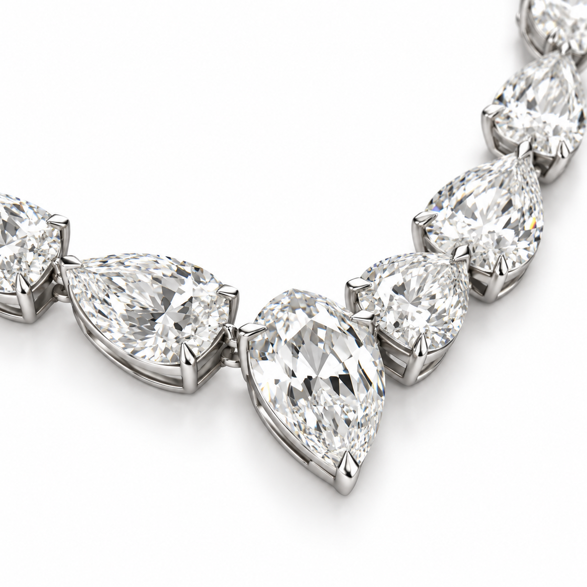 A close-up of a diamond choker featuring pear-cut and round brilliant-cut diamonds set in platinum, shown against a plain white background.