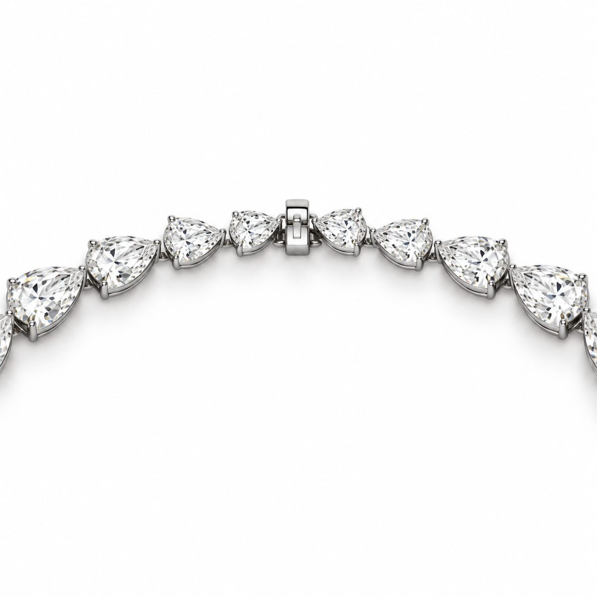 A close-up of a diamond necklace featuring pear-cut and round brilliant-cut diamonds set in platinum, shown against a plain white background.