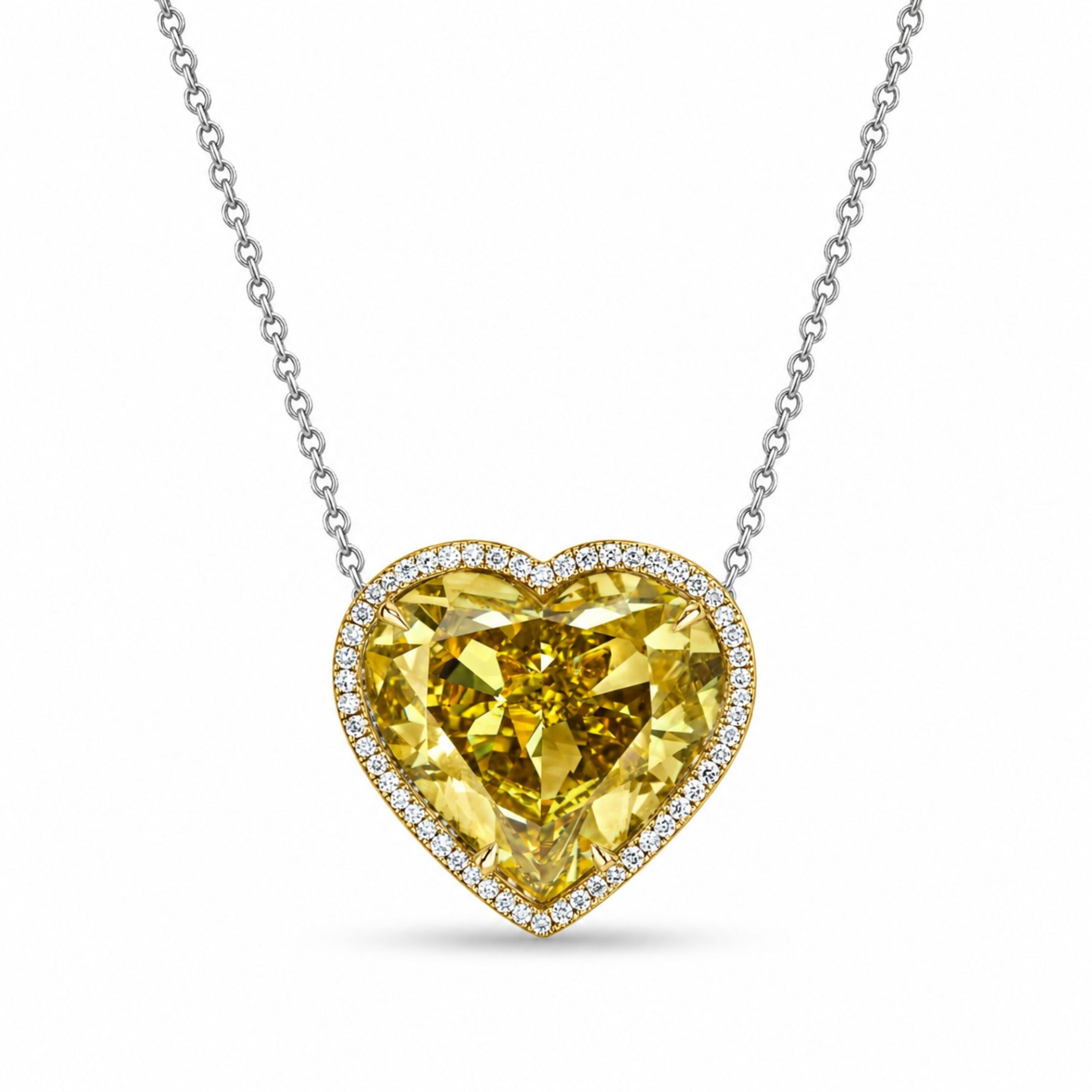 Leviev 18K yellow and white gold heart pendant necklace with vivid yellow diamond center and white diamond halo
