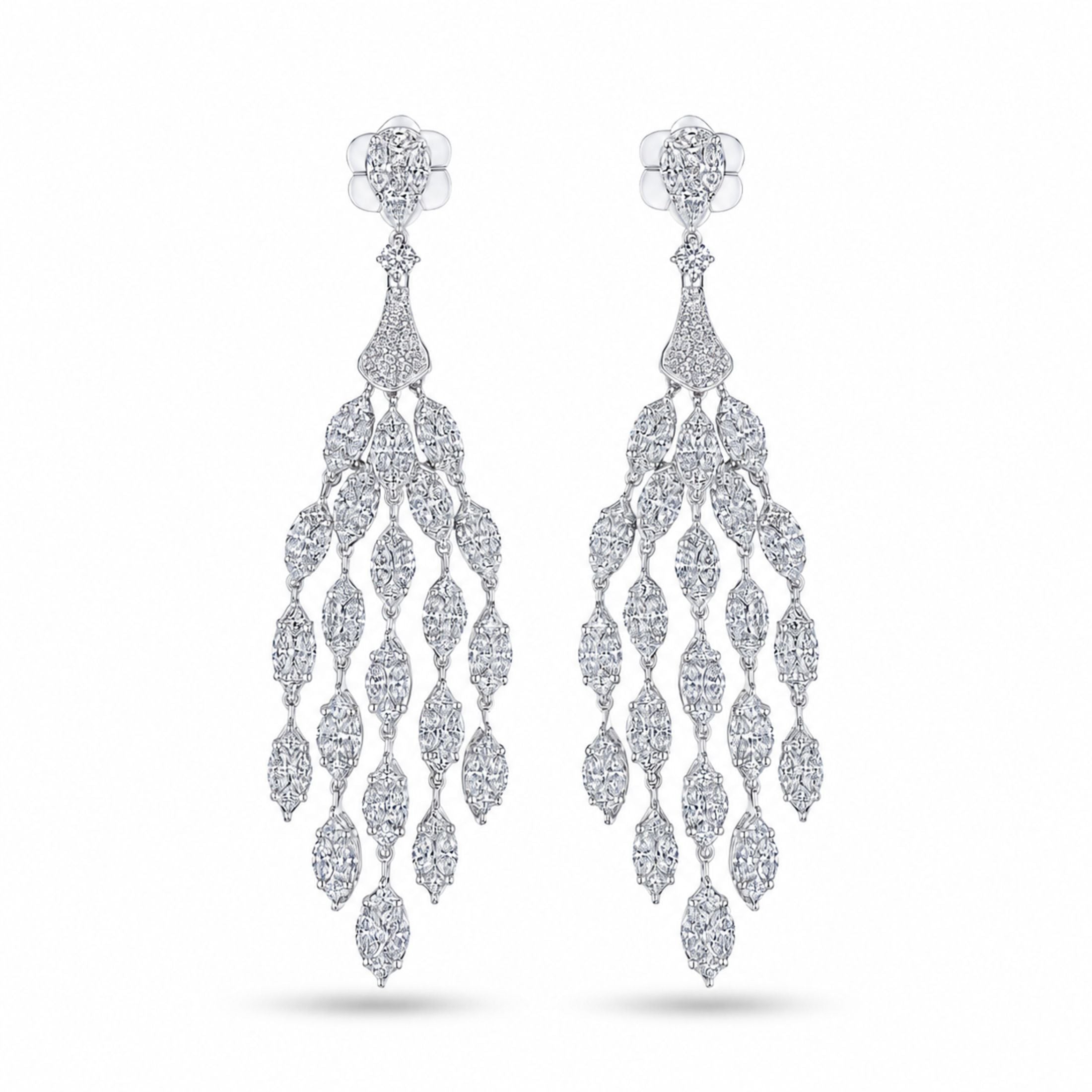 Pair of Leviev Rivulet drop earrings featuring floral top cluster and asymmetrical diamond chandelier dangle