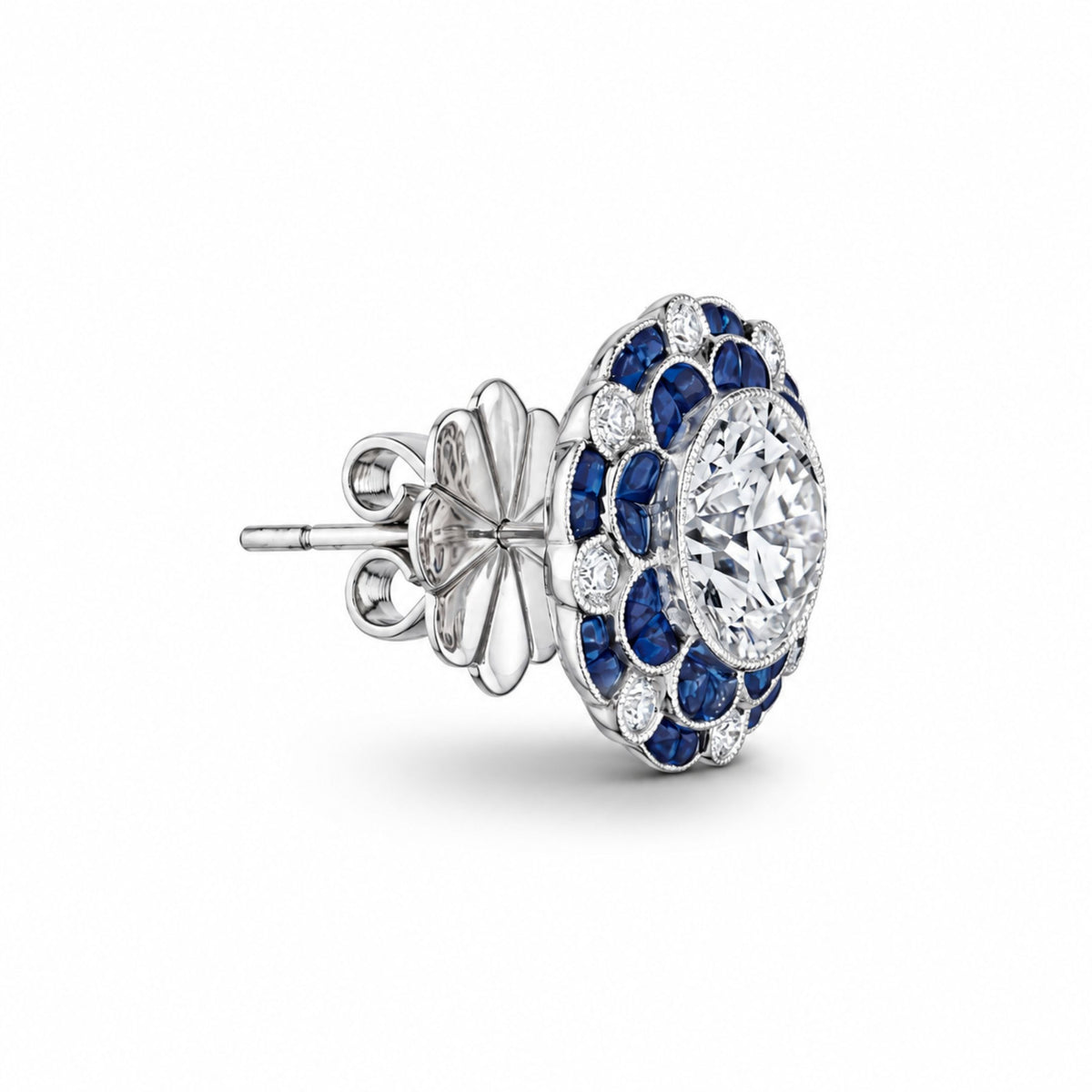 Leviev Sapphire Blossom stud earring side view with 18K white gold floral halo, royal blue sapphire cabochons, and diamond accents