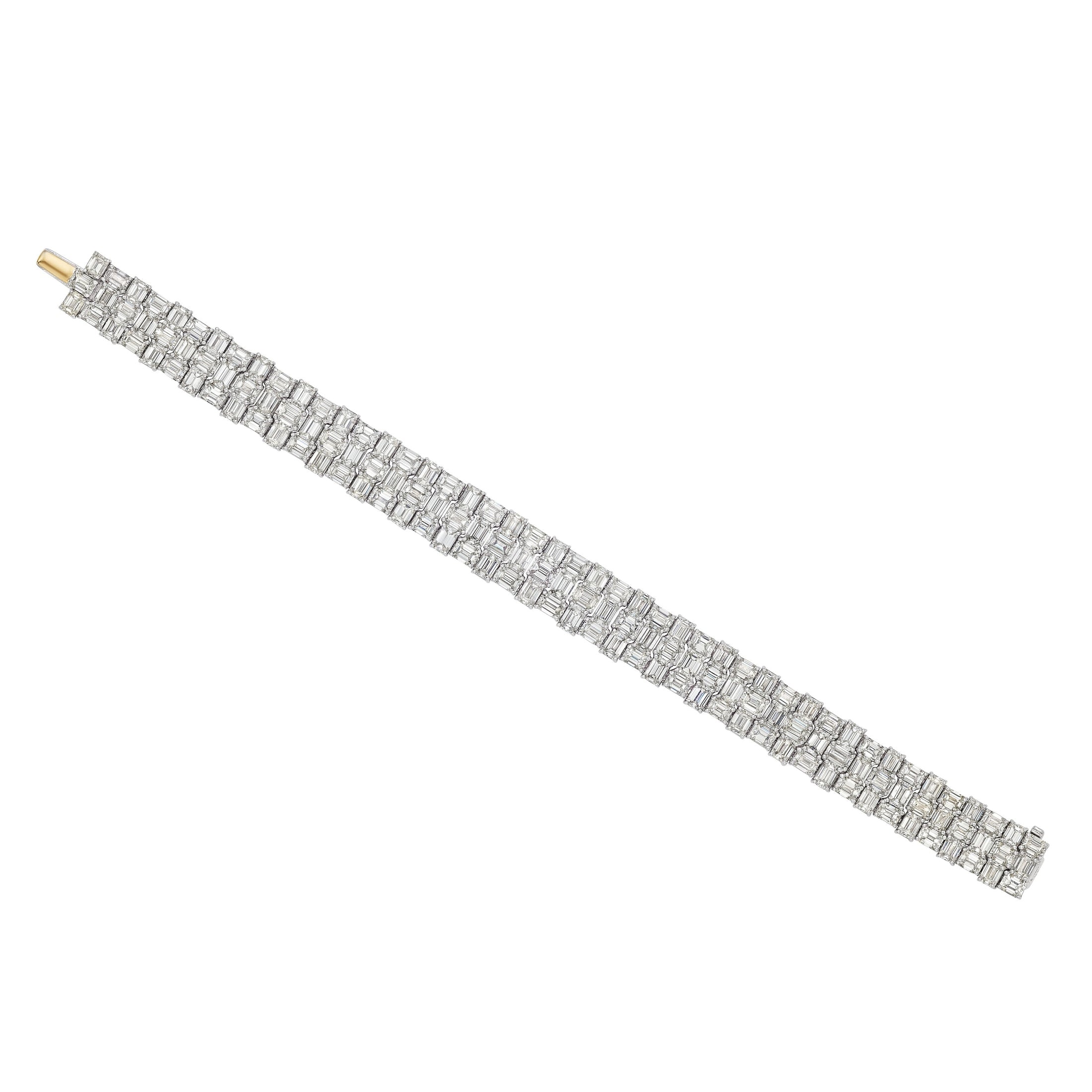 Leviev Theia 18K white gold diamond bracelet featuring yellow gold end caps and staggered emerald-cut stones