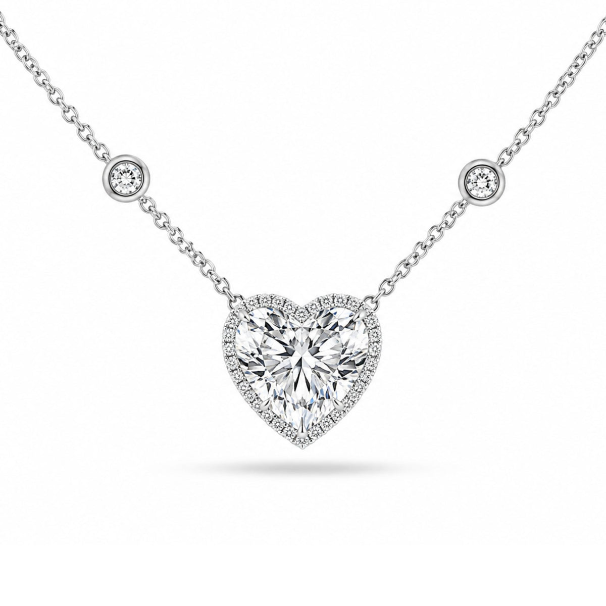 Leviev Valentina platinum heart diamond pendant necklace with bezel halo and diamond accents on chain