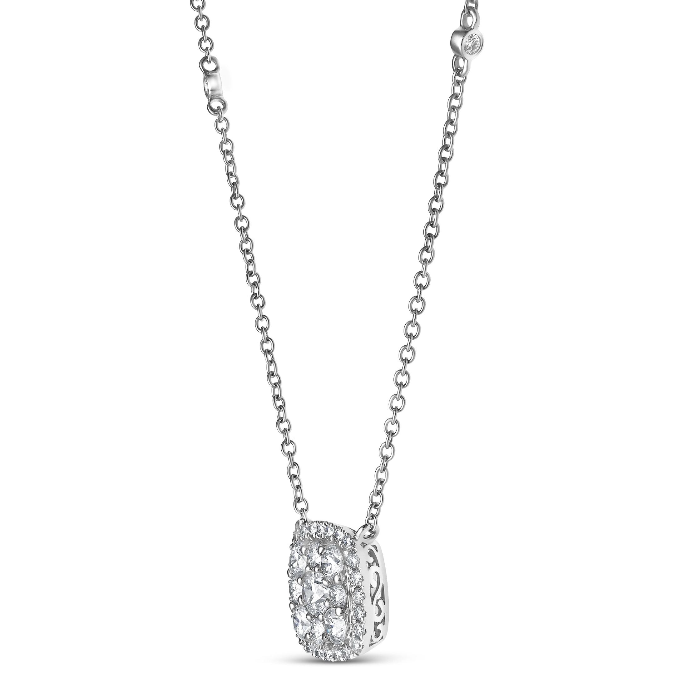 Side view of 18K white gold square diamond illusion pendant showing depth, facets, and scrollwork cutouts