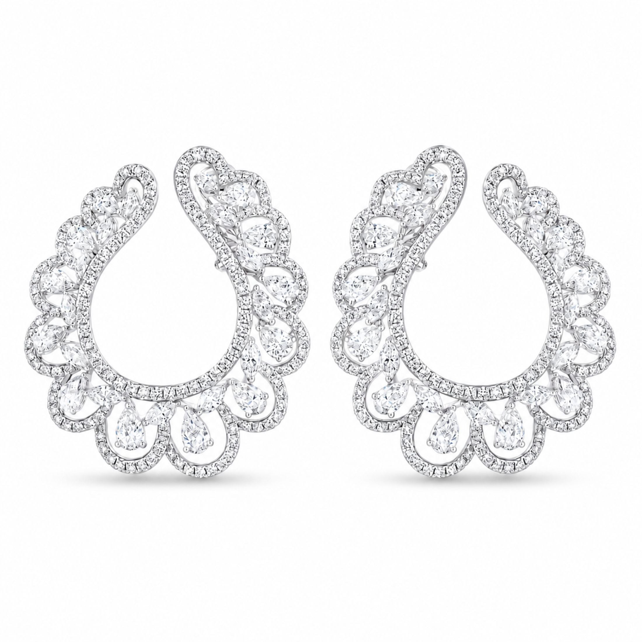 Pair of Venetian Lace diamond cuff earrings in 18K white gold featuring asymmetrical scalloped lace filigree design