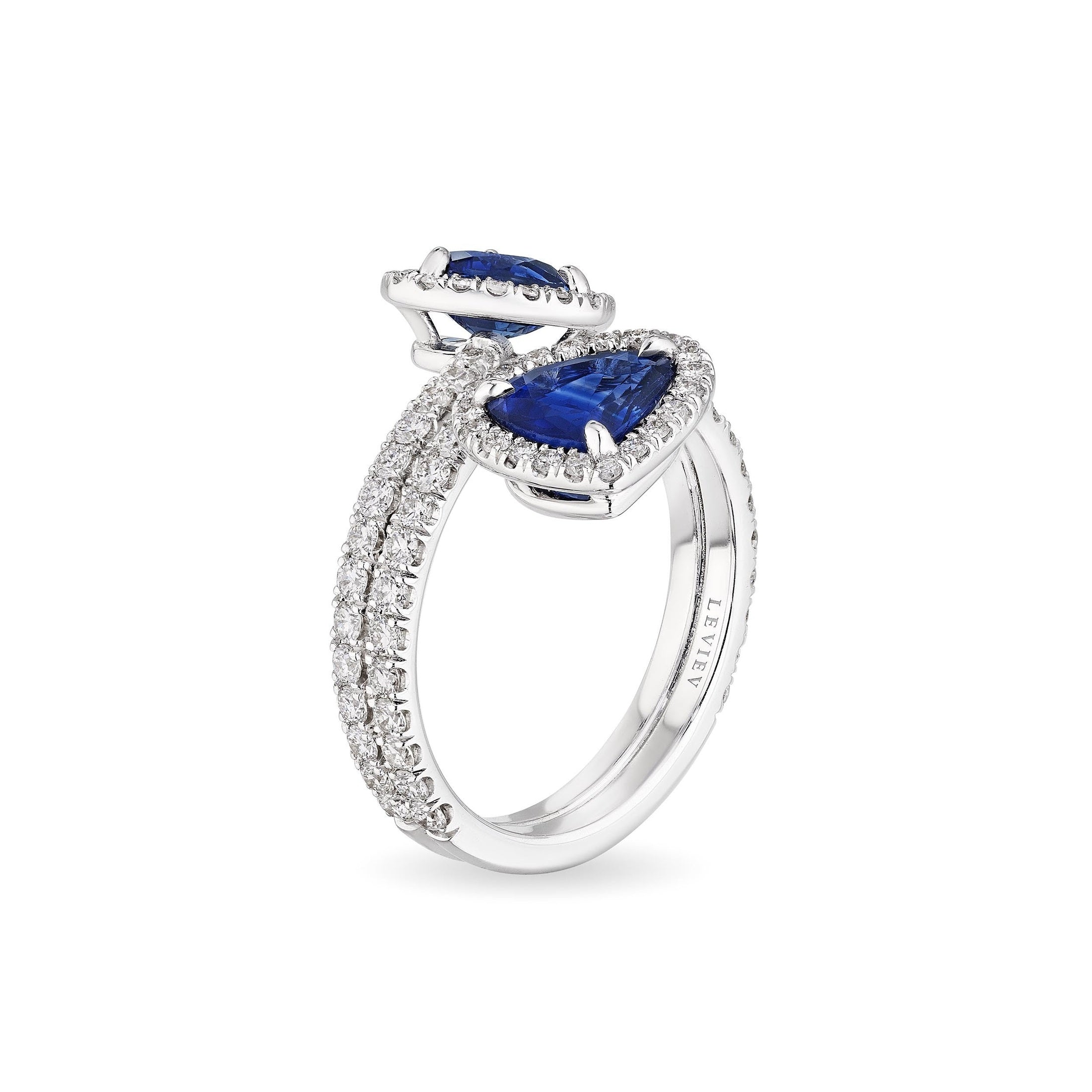 Side view Leviev 18K white gold bypass ring featuring dual diamond bands and sapphire accents