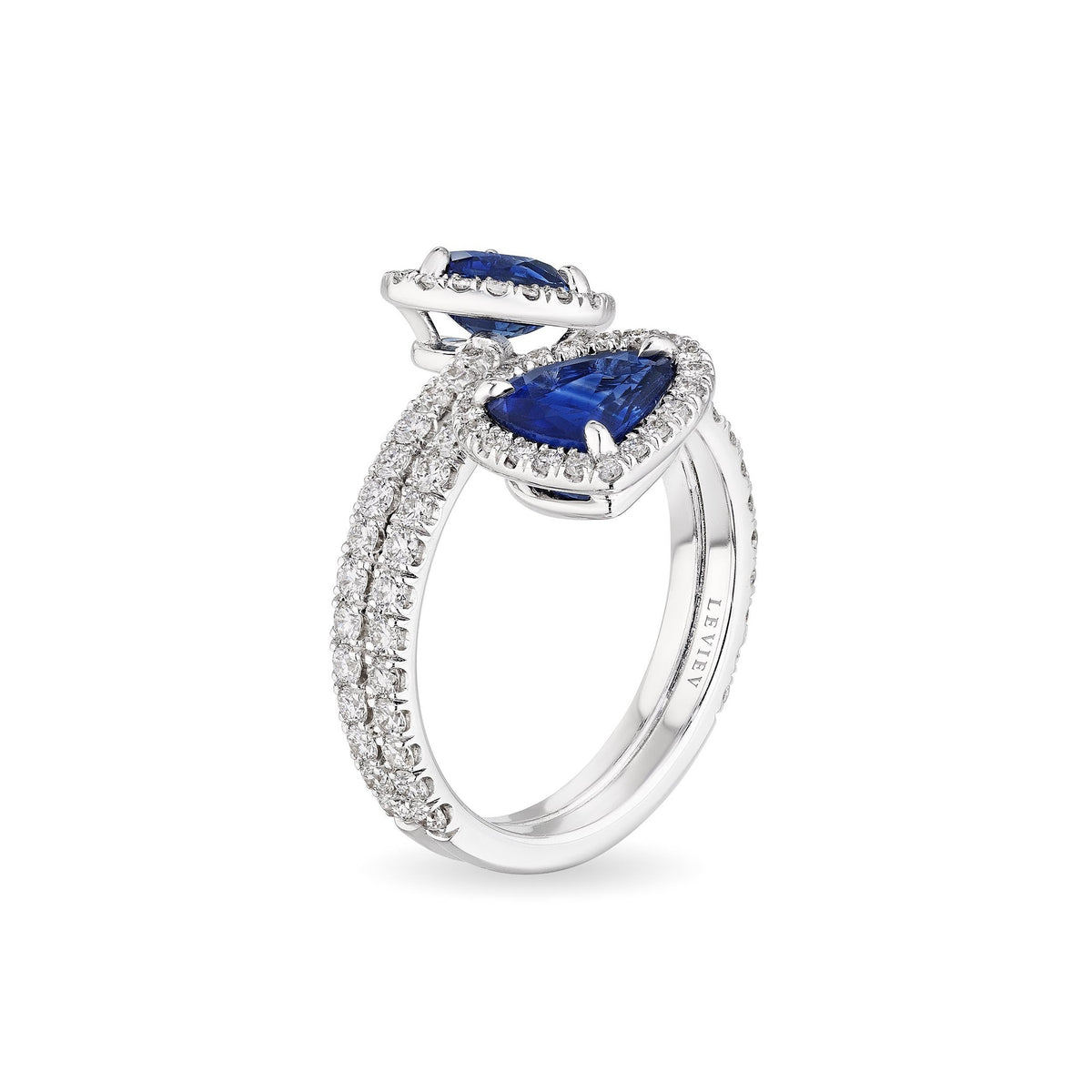 Side view Leviev 18K white gold bypass ring featuring dual diamond bands and sapphire accents