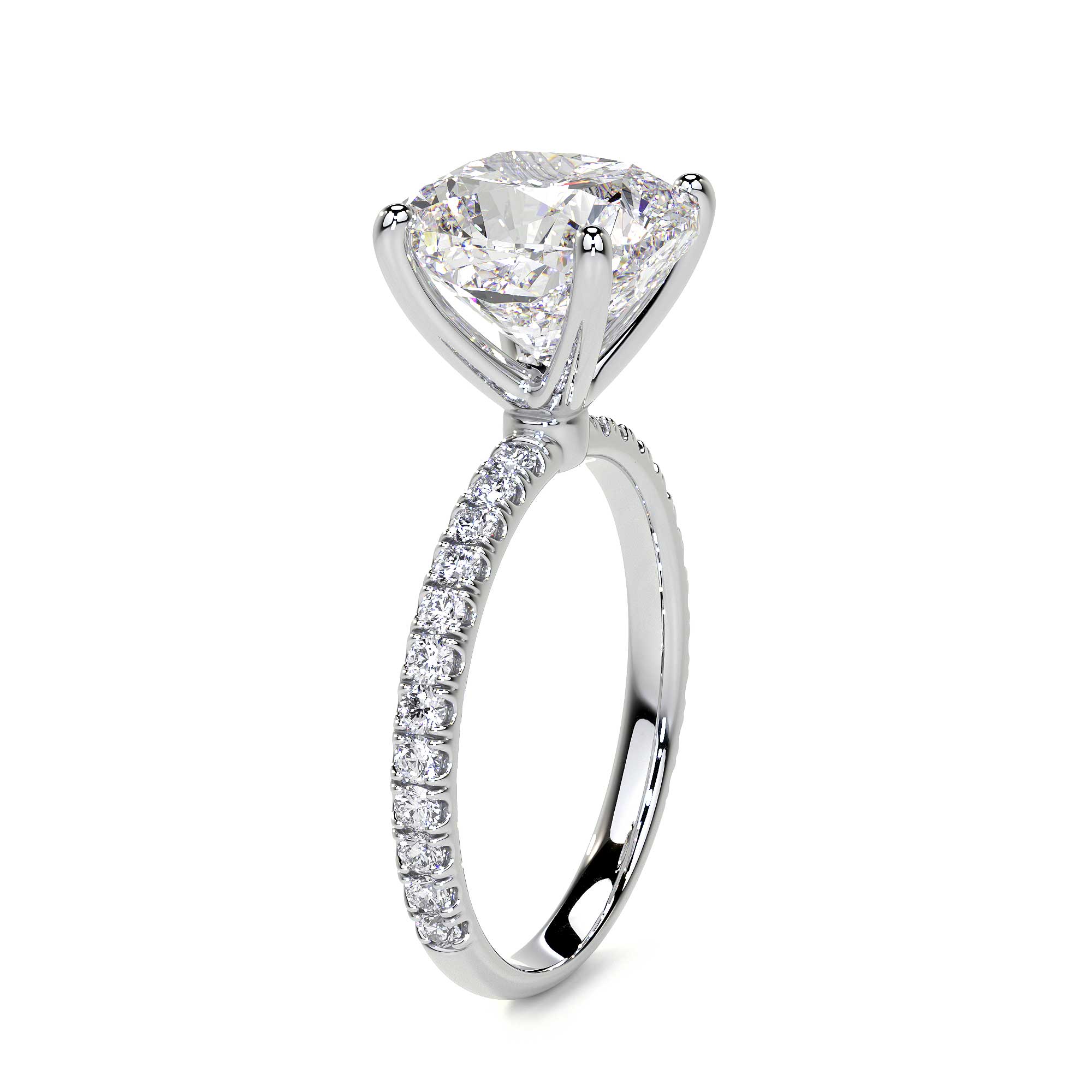Side view of 18K white gold cushion cut diamond ring with full pavé band and four prong setting