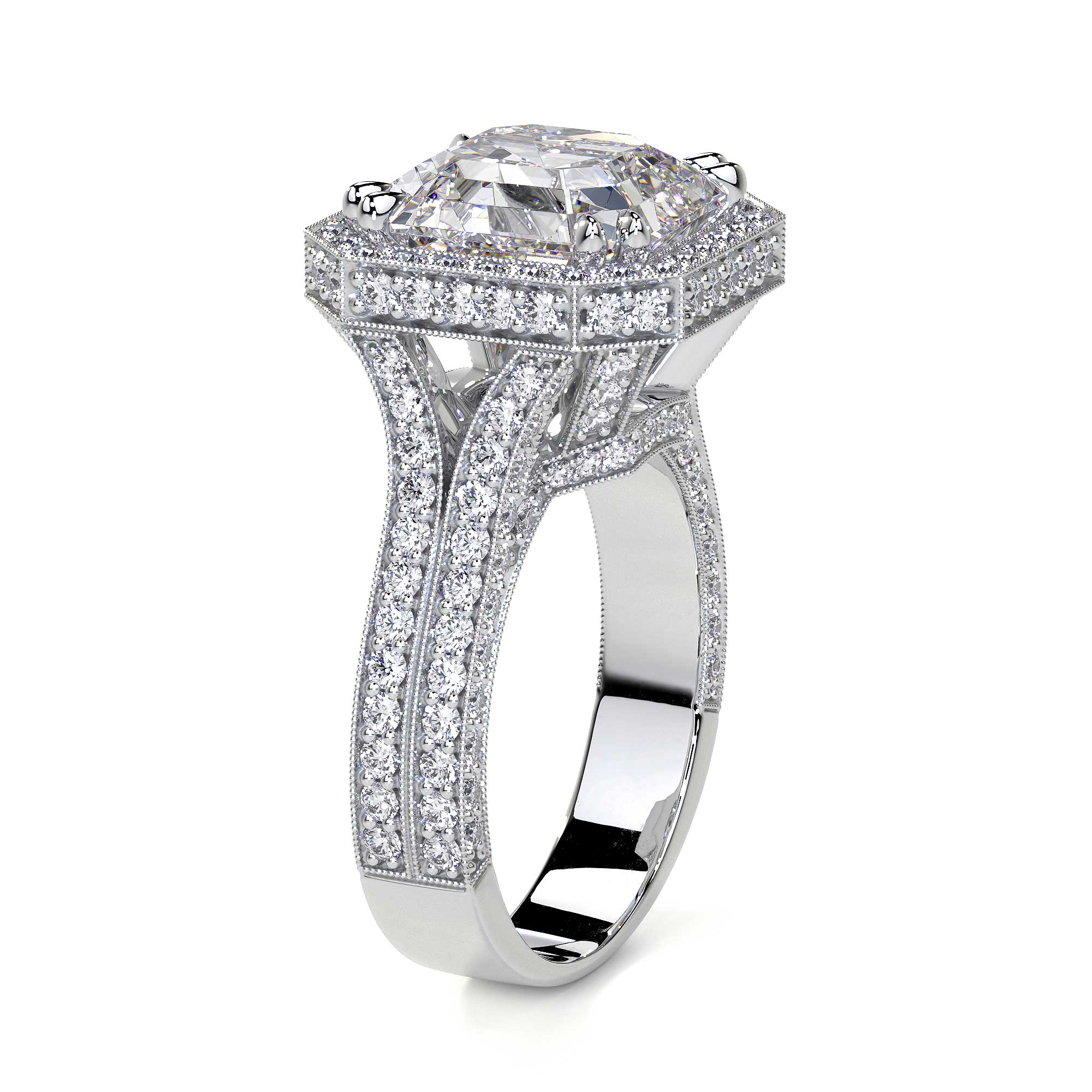 Angled view of platinum emerald cut diamond ring tiered pavé depth