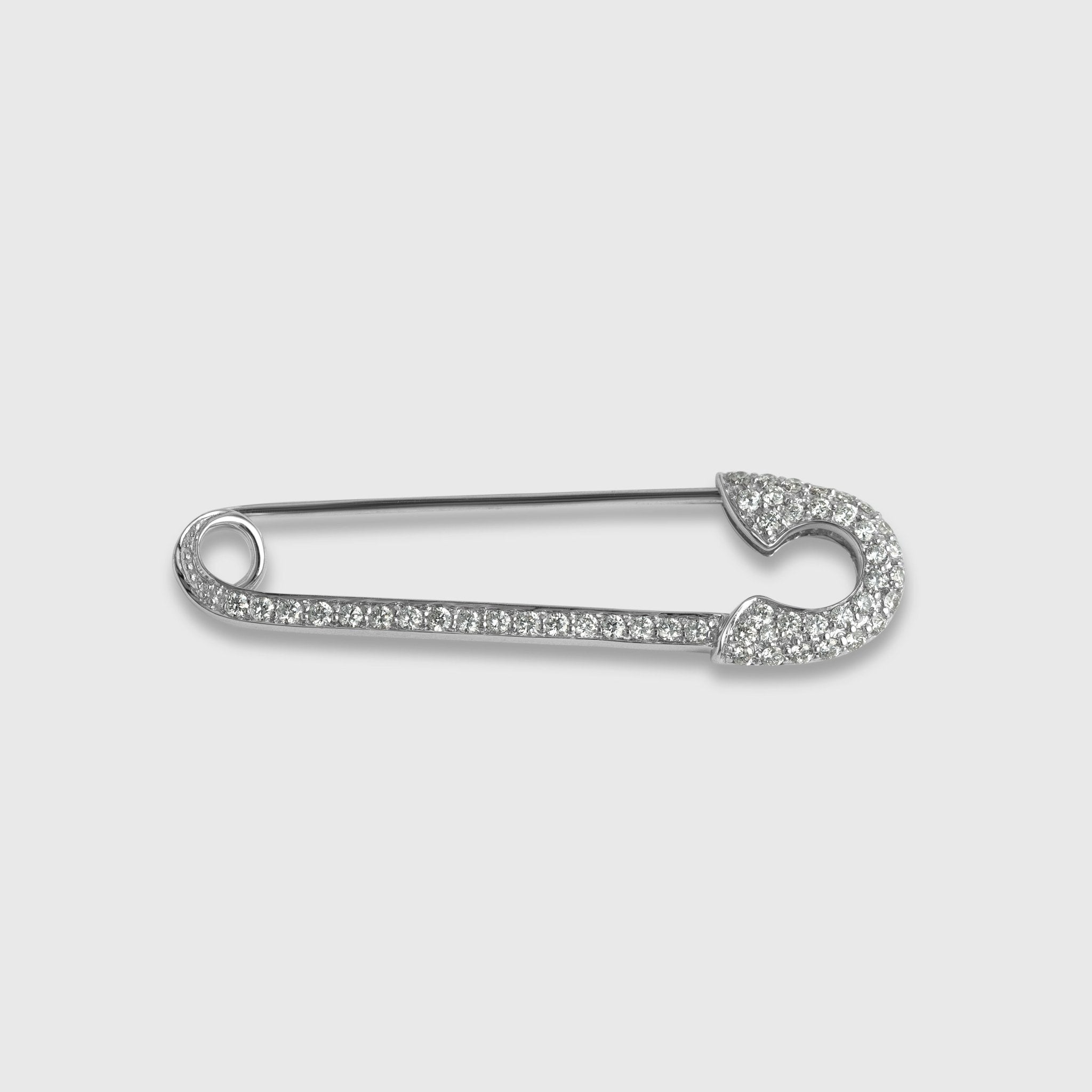 Silver brooch with white stones in safety pin design silver