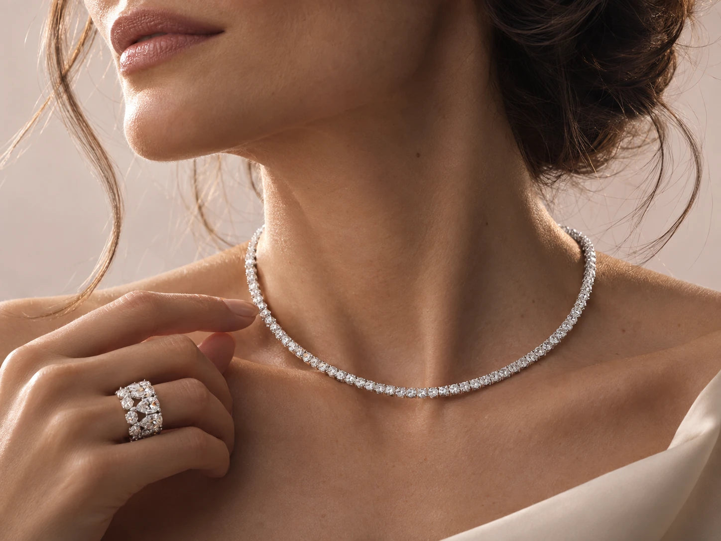 Leviev Waverly diamond necklace and Coronet diamond ring styled on a model